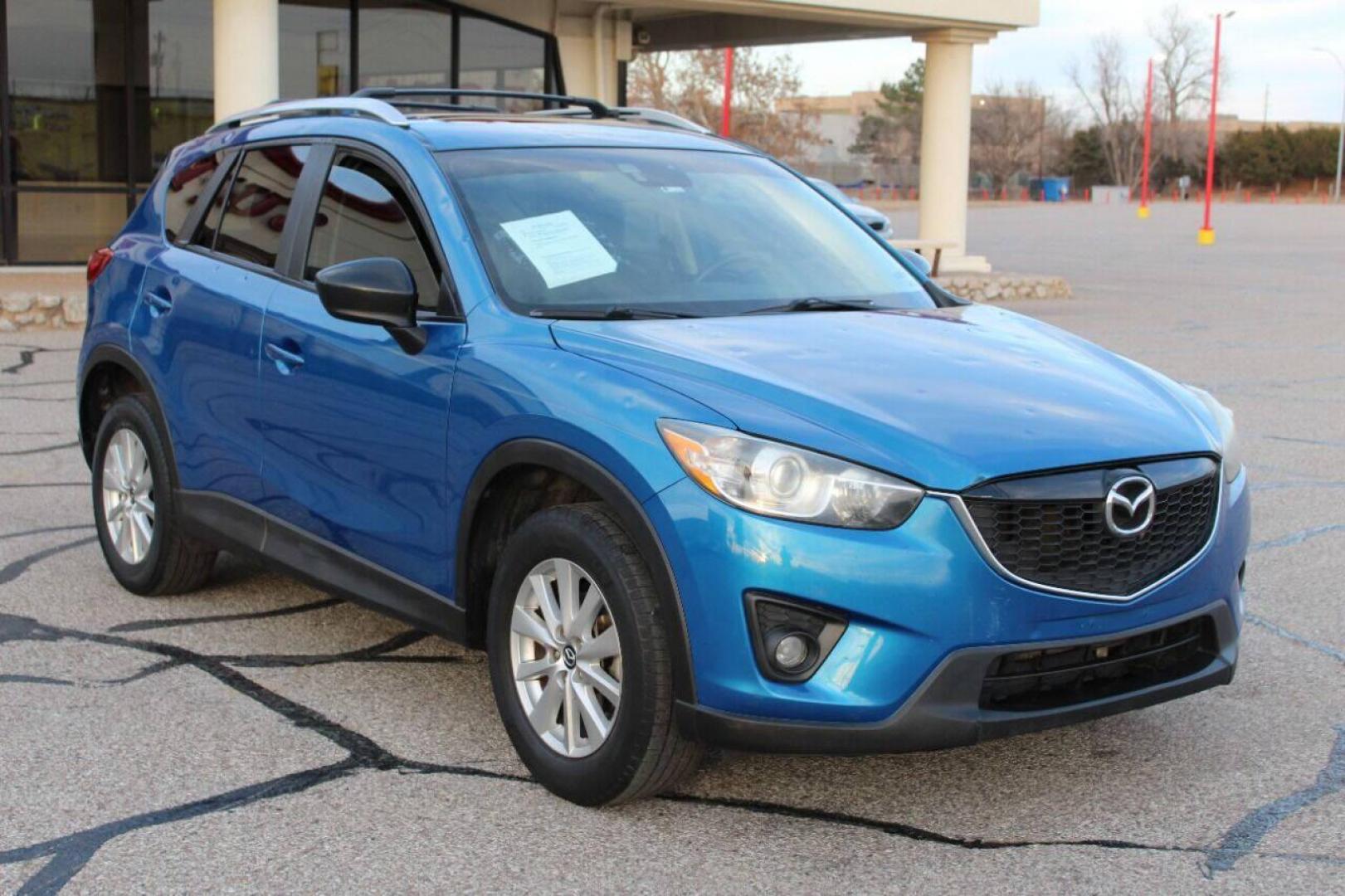 2014 Blue Mazda CX-5 Grand Touring (JM3KE2DY0E0) with an 2.5L L4 DOHC 16V engine, 6-Speed Automatic transmission, located at 4301 NW 39th , Oklahoma City, OK, 73112, (405) 949-5600, 35.512135, -97.598671 - NO DRIVERS LICENCE NO-FULL COVERAGE INSURANCE-NO CREDIT CHECK. COME ON OVER TO SUPERSPORTS AND TAKE A LOOK AND TEST DRIVE. PLEASE GIVE US A CALL AT (405) 949-5600. NO LICENSIA DE MANEJAR- NO SEGURO DE COBERTURA TOTAL- NO VERIFICACCION DE CREDITO. POR FAVOR VENGAN A SUPERSPORTS, ECHE UN - Photo#0