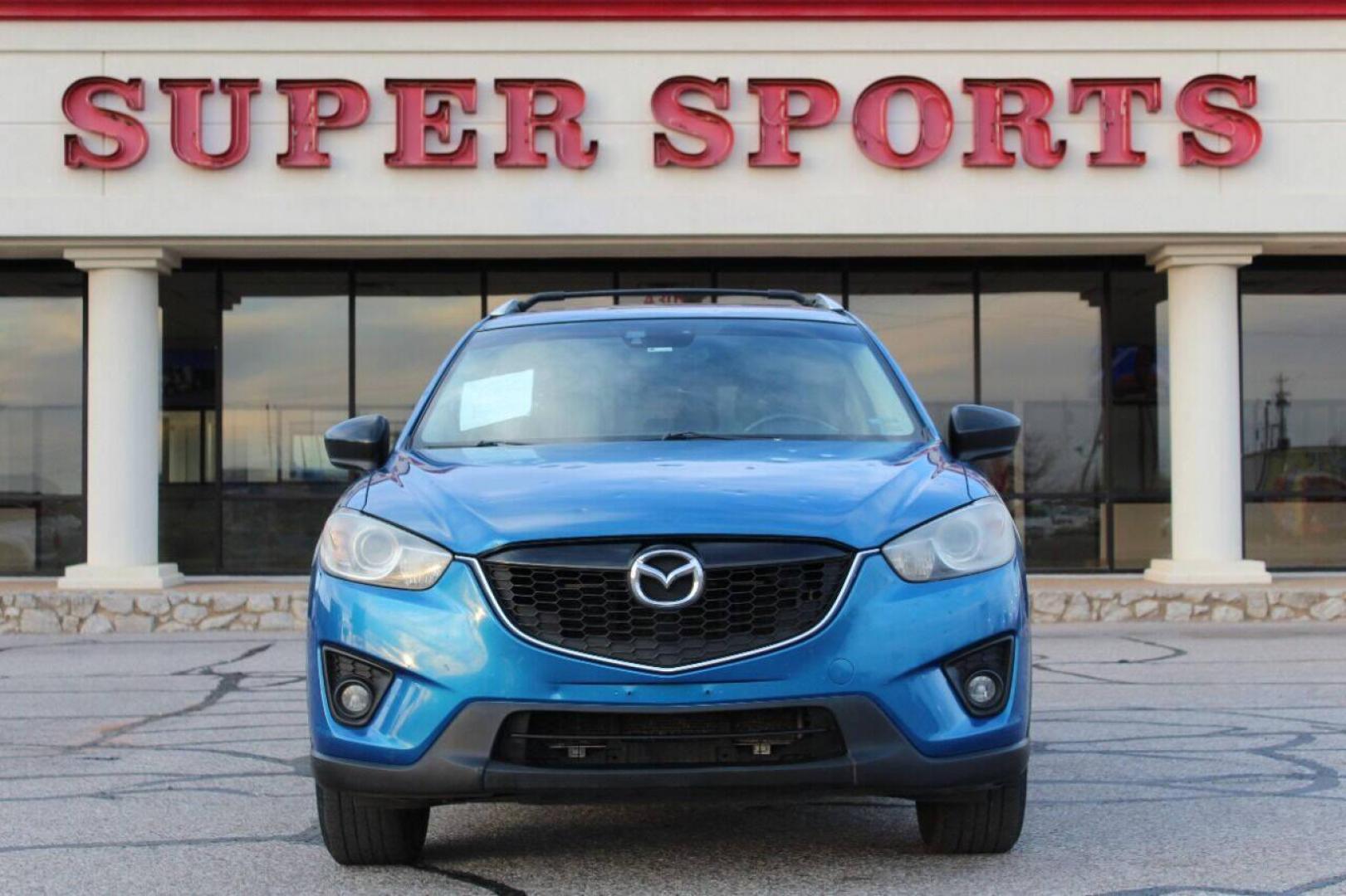 2014 Blue Mazda CX-5 Grand Touring (JM3KE2DY0E0) with an 2.5L L4 DOHC 16V engine, 6-Speed Automatic transmission, located at 4301 NW 39th , Oklahoma City, OK, 73112, (405) 949-5600, 35.512135, -97.598671 - NO DRIVERS LICENCE NO-FULL COVERAGE INSURANCE-NO CREDIT CHECK. COME ON OVER TO SUPERSPORTS AND TAKE A LOOK AND TEST DRIVE. PLEASE GIVE US A CALL AT (405) 949-5600. NO LICENSIA DE MANEJAR- NO SEGURO DE COBERTURA TOTAL- NO VERIFICACCION DE CREDITO. POR FAVOR VENGAN A SUPERSPORTS, ECHE UN - Photo#2