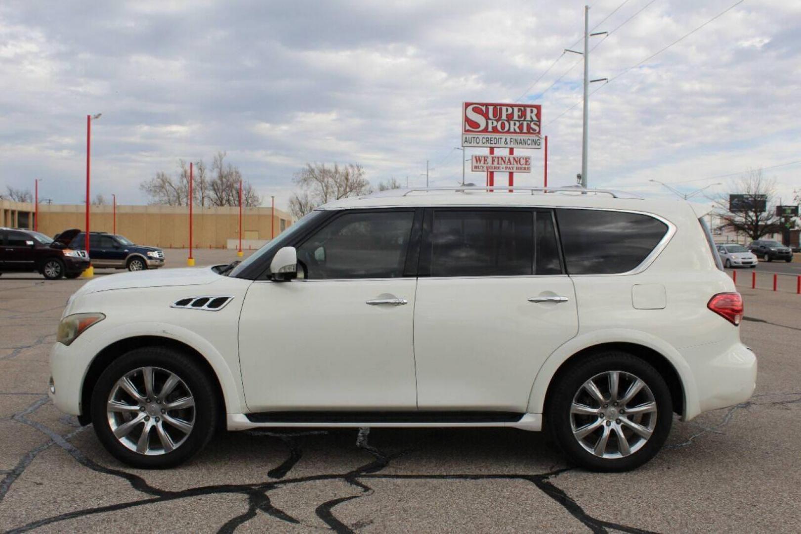 2013 White Infiniti QX56 4WD (JN8AZ2NE7D9) with an 5.6L V8 DOHC 32V engine, 5-Speed Automatic transmission, located at 4301 NW 39th , Oklahoma City, OK, 73112, (405) 949-5600, 35.512135, -97.598671 - NO DRIVERS LICENCE NO-FULL COVERAGE INSURANCE-NO CREDIT CHECK. COME ON OVER TO SUPERSPORTS AND TAKE A LOOK AND TEST DRIVE. PLEASE GIVE US A CALL AT (405) 949-5600. NO LICENSIA DE MANEJAR- NO SEGURO DE COBERTURA TOTAL- NO VERIFICACCION DE CREDITO. POR FAVOR VENGAN A SUPERSPORTS, ECHE UN - Photo#2