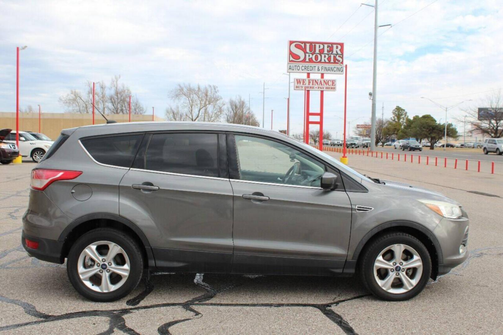 2014 Gray Ford Escape (1FMCU0GX4EU) with an 1.6L I4 Turbocharger 1.6L I4 engine, Automatic 6-Speed transmission, located at 4301 NW 39th , Oklahoma City, OK, 73112, (405) 949-5600, 35.512135, -97.598671 - Photo#3