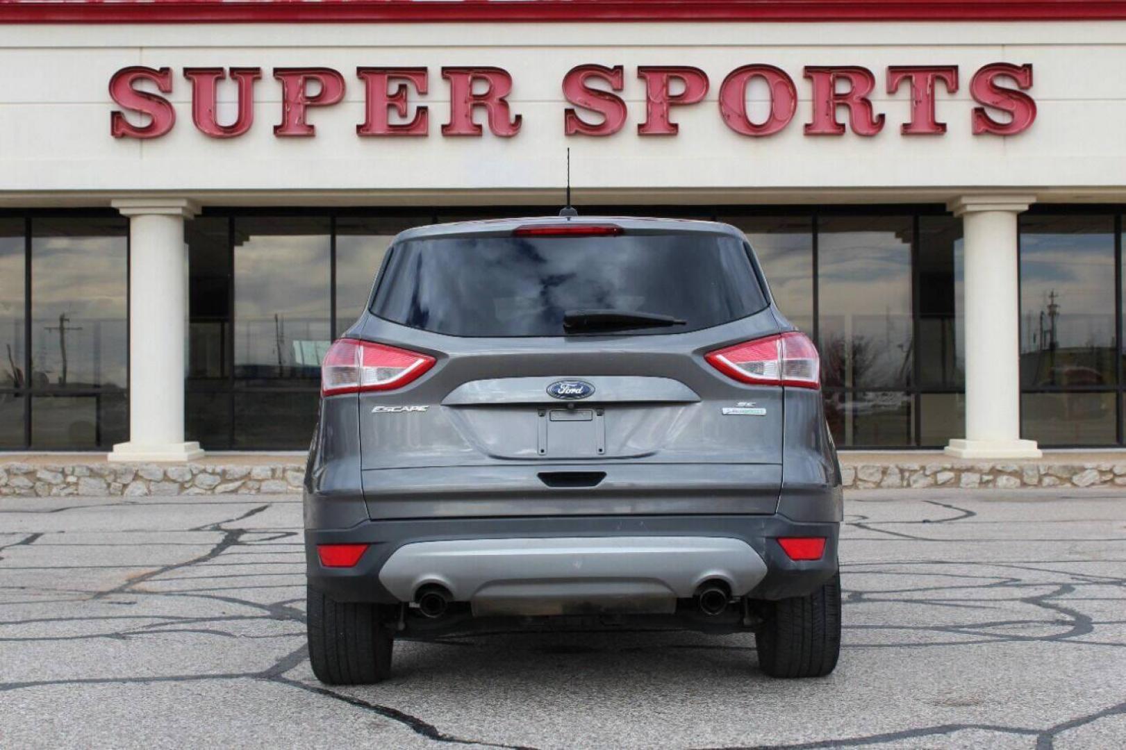 2014 Gray Ford Escape (1FMCU0GX4EU) with an 1.6L I4 Turbocharger 1.6L I4 engine, Automatic 6-Speed transmission, located at 4301 NW 39th , Oklahoma City, OK, 73112, (405) 949-5600, 35.512135, -97.598671 - Photo#4