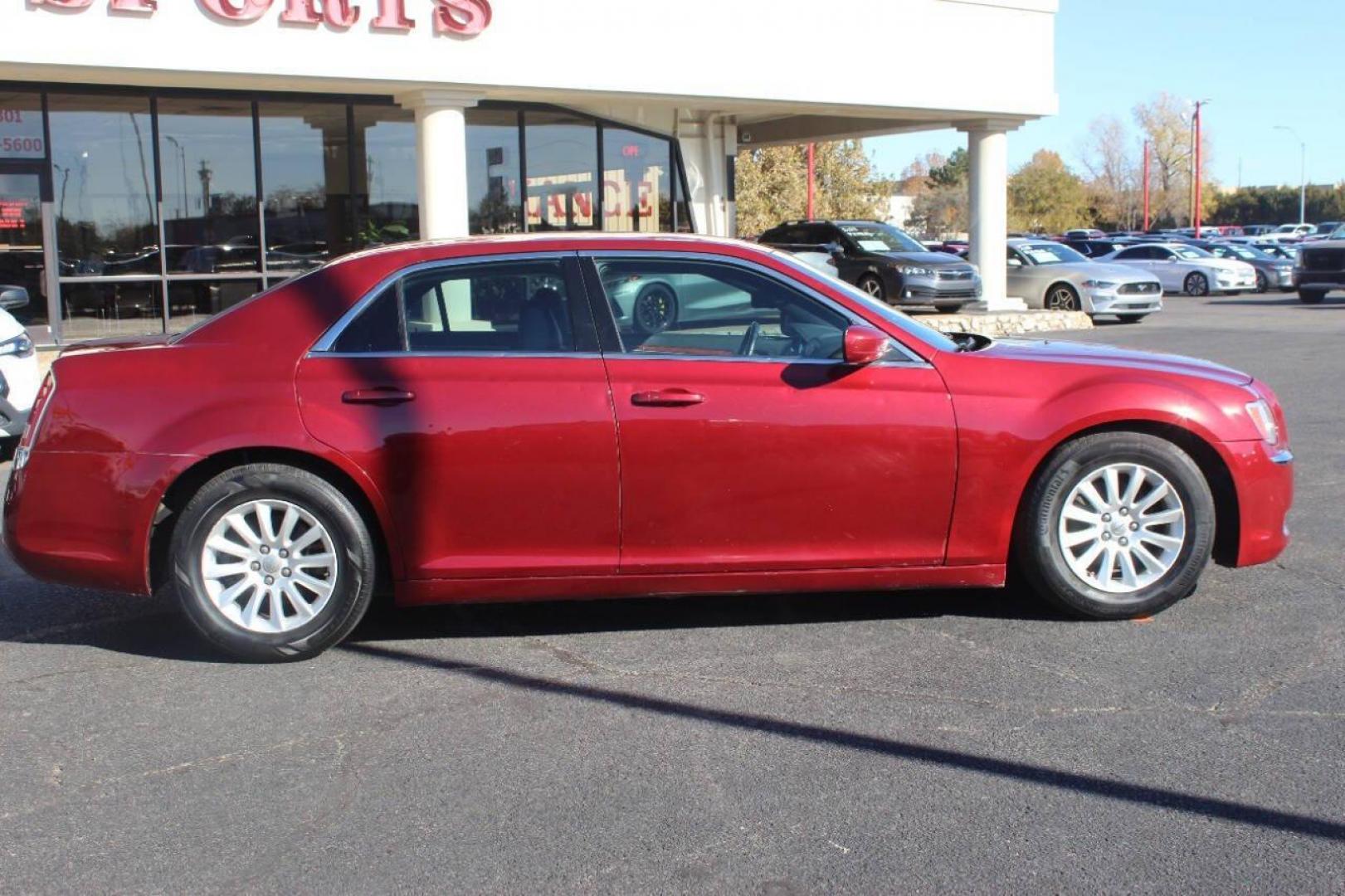 2013 Burgundy Chrysler 300 RWD (2C3CCAAG5DH) with an 3.6L V6 SOHC 24V engine, 8-Speed Automatic transmission, located at 4301 NW 39th , Oklahoma City, OK, 73112, (405) 949-5600, 35.512135, -97.598671 - NO DRIVERS LICENCE NO-FULL COVERAGE INSURANCE-NO CREDIT CHECK. COME ON OVER TO SUPERSPORTS AND TAKE A LOOK AND TEST DRIVE. PLEASE GIVE US A CALL AT (405) 949-5600. NO LICENSIA DE MANEJAR- NO SEGURO DE COBERTURA TOTAL- NO VERIFICACCION DE CREDITO. POR FAVOR VENGAN A SUPERSPORTS, - Photo#2