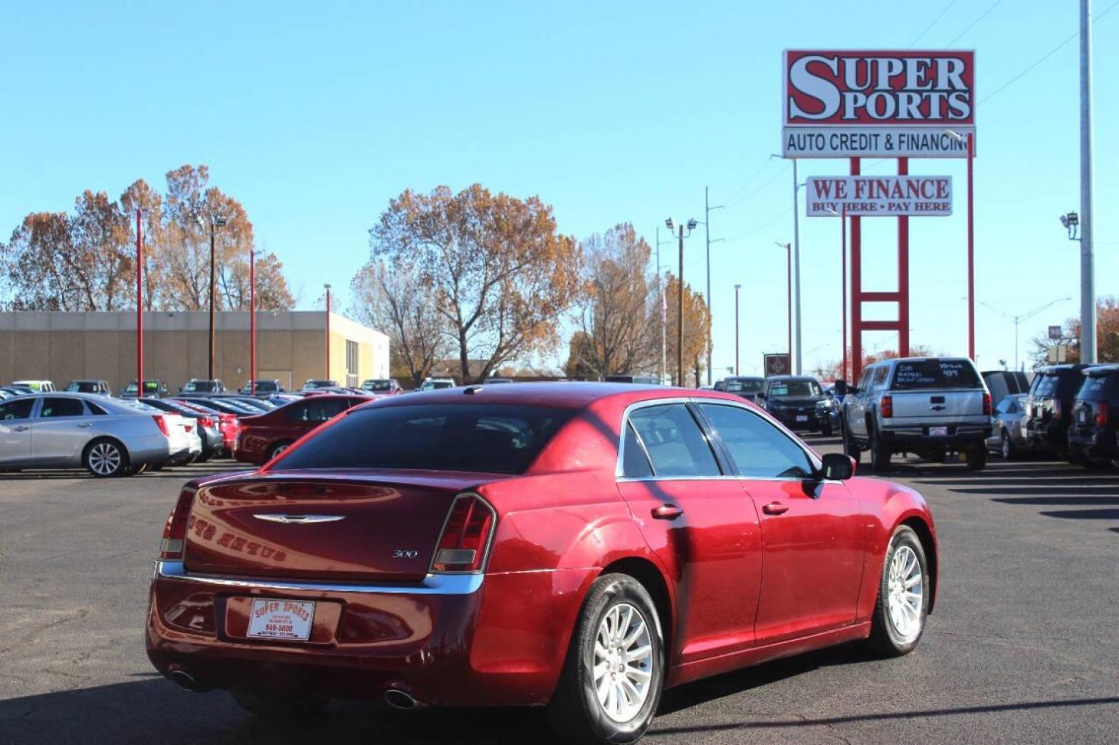 2013 Burgundy Chrysler 300 RWD (2C3CCAAG5DH) with an 3.6L V6 SOHC 24V engine, 8-Speed Automatic transmission, located at 4301 NW 39th , Oklahoma City, OK, 73112, (405) 949-5600, 35.512135, -97.598671 - NO DRIVERS LICENCE NO-FULL COVERAGE INSURANCE-NO CREDIT CHECK. COME ON OVER TO SUPERSPORTS AND TAKE A LOOK AND TEST DRIVE. PLEASE GIVE US A CALL AT (405) 949-5600. NO LICENSIA DE MANEJAR- NO SEGURO DE COBERTURA TOTAL- NO VERIFICACCION DE CREDITO. POR FAVOR VENGAN A SUPERSPORTS, - Photo#3