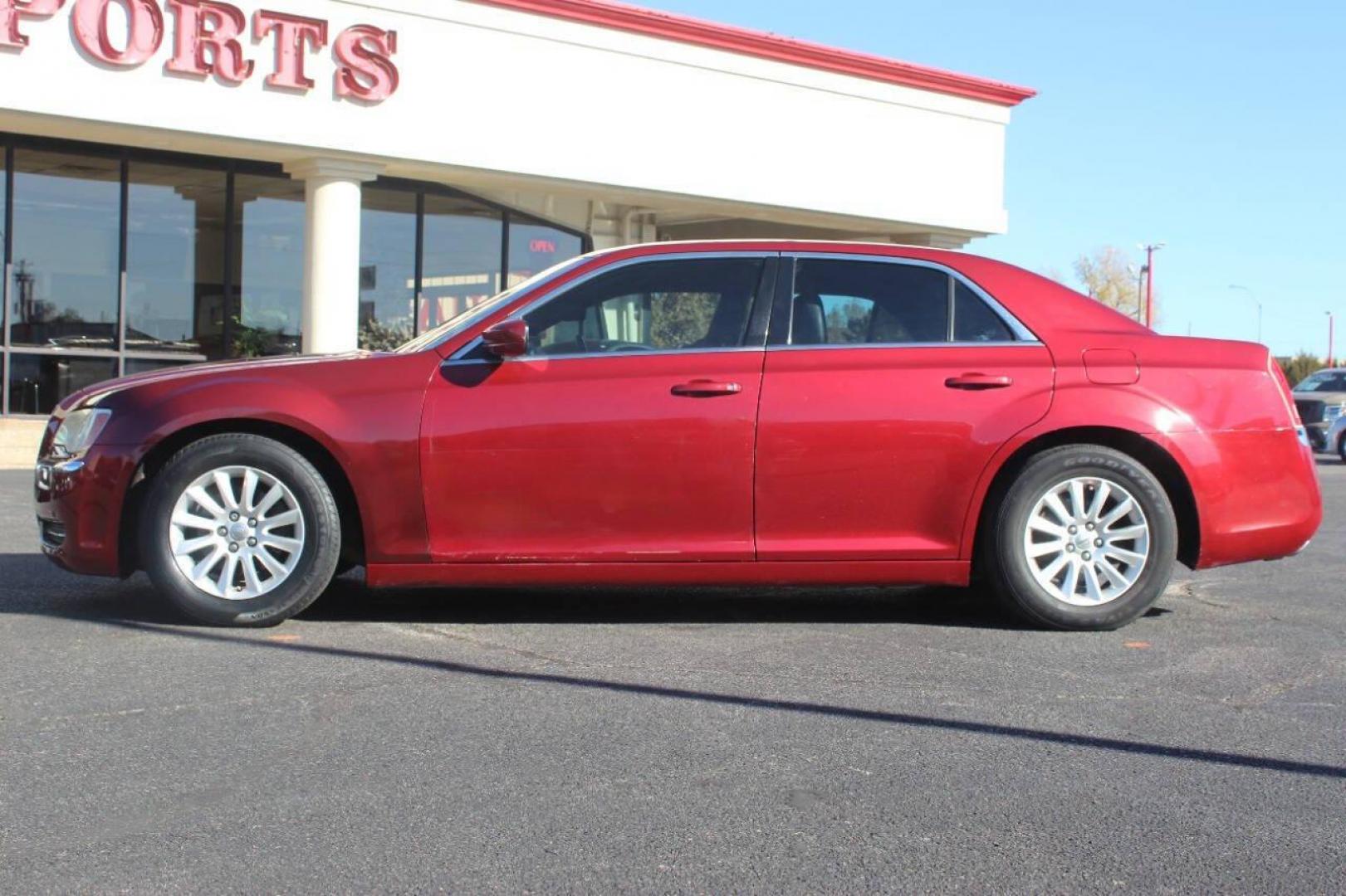 2013 Burgundy Chrysler 300 RWD (2C3CCAAG5DH) with an 3.6L V6 SOHC 24V engine, 8-Speed Automatic transmission, located at 4301 NW 39th , Oklahoma City, OK, 73112, (405) 949-5600, 35.512135, -97.598671 - NO DRIVERS LICENCE NO-FULL COVERAGE INSURANCE-NO CREDIT CHECK. COME ON OVER TO SUPERSPORTS AND TAKE A LOOK AND TEST DRIVE. PLEASE GIVE US A CALL AT (405) 949-5600. NO LICENSIA DE MANEJAR- NO SEGURO DE COBERTURA TOTAL- NO VERIFICACCION DE CREDITO. POR FAVOR VENGAN A SUPERSPORTS, - Photo#5