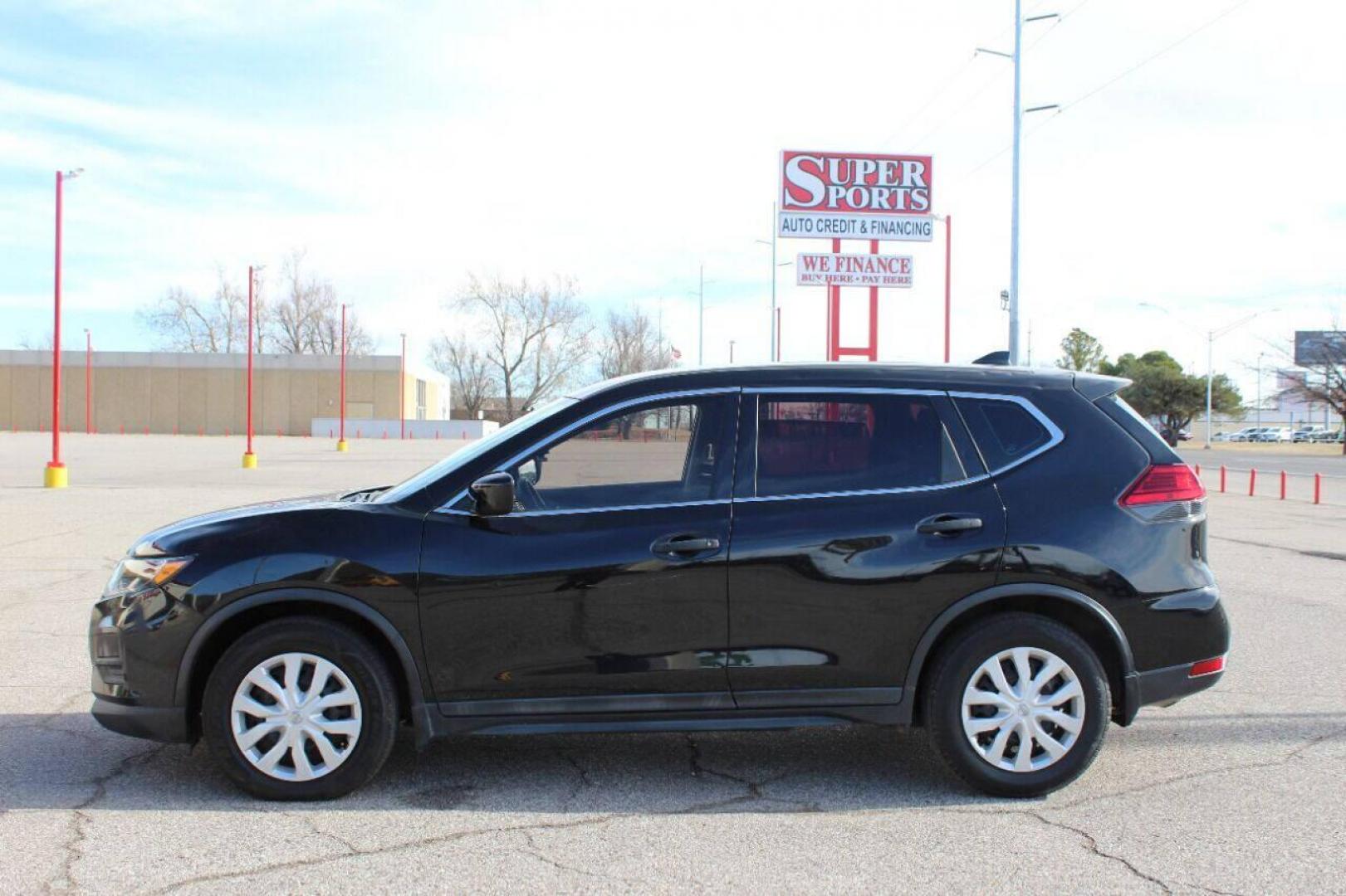 2017 Black Nissan Rogue SV 2WD (5N1AT2MTXHC) with an 2.5L L4 DOHC 16V engine, CVT transmission, located at 4301 NW 39th , Oklahoma City, OK, 73112, (405) 949-5600, 35.512135, -97.598671 - NO DRIVERS LICENSE - NO FULL COVERAGE INSURANCE - NO CREDIT CHECK. COME ON OVER TO SUPERSPORTS AND TAKE A LOOK AND TEST DRIVE PLEASE GIVE US A CALL AT (405) 949-5600. NO LICENCIA DE MANEJAR - NO SEGURO DE COBERTURA TOTAL - NO VERIFICACION DE CREDITO. POR FAVOR VENGAN A SUPERSPORTS, ECHE - Photo#5