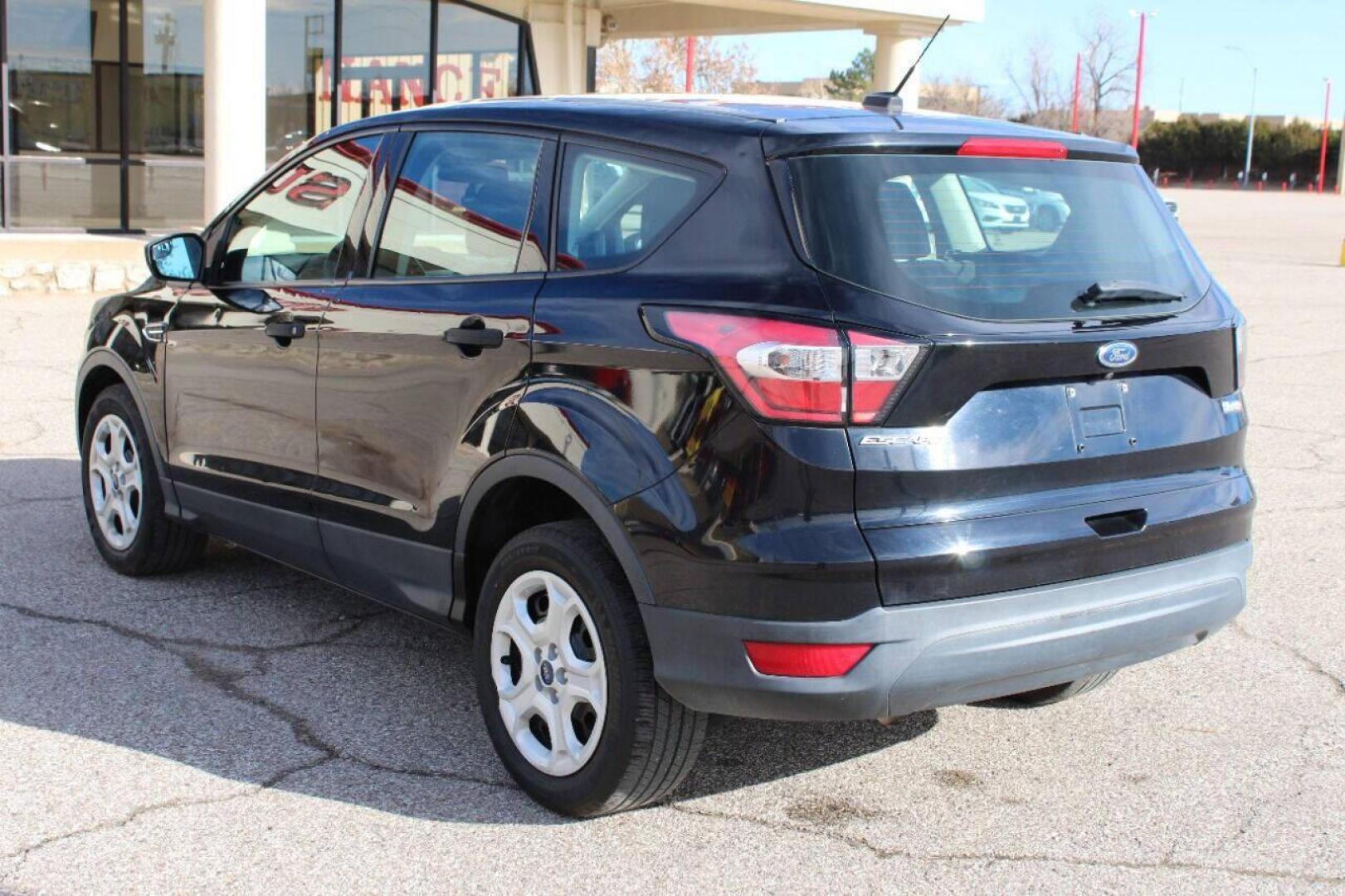 2017 Black Ford Escape (1FMCU0F73HU) with an 2.5L I4 2.5L I4 engine, Automatic 6-Speed transmission, located at 4301 NW 39th , Oklahoma City, OK, 73112, (405) 949-5600, 35.512135, -97.598671 - NO DRIVERS LICENCE - NO FULL COVERAGE INSURANCE - NO CREDIT CHECK. COME ON OVER TO SUPERSPORTS AND TAKE A LOOK AND TEST DRIVE. PLEASE GIVE US A CALL AT (405) 949-5600. NO LICENCIA DE MANEJAR - NO SEGURO DE COBERTURA TOTAL - NO VERIFICACION DE CREDITO. POR FAVOR VENGAN A SUPERSPORTS, ECH - Photo#3