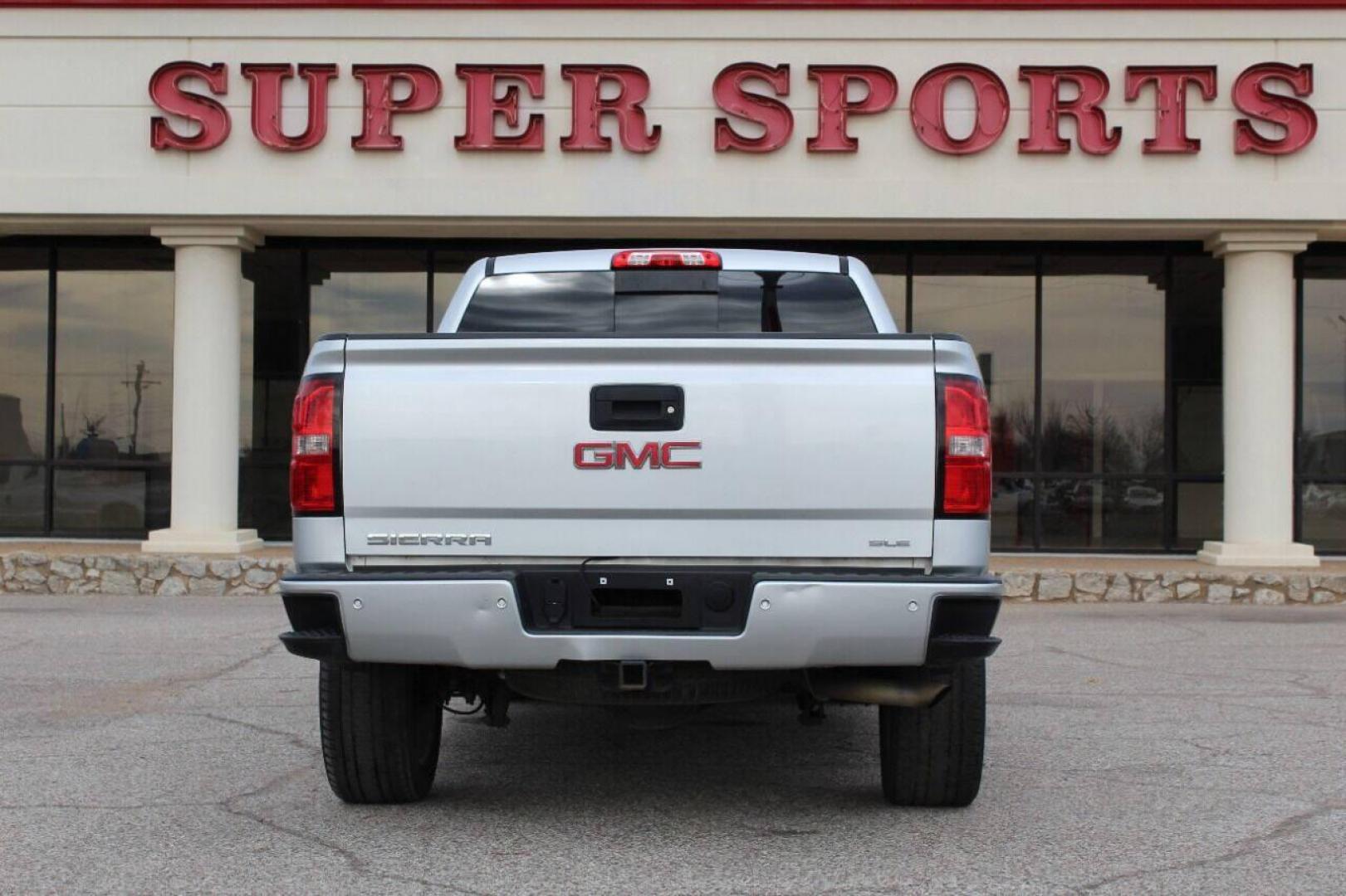 2015 Silver GMC Sierra 1500 SLE Crew Cab Long Box 2WD (3GTP1UEC7FG) with an 5.3L V8 OHV 16V engine, 6-Speed Automatic transmission, located at 4301 NW 39th , Oklahoma City, OK, 73112, (405) 949-5600, 35.512135, -97.598671 - NO DRIVERS LICENCE NO-FULL COVERAGE INSURANCE-NO CREDIT CHECK. COME ON OVER TO SUPERSPORTS AND TAKE A LOOK AND TEST DRIVE. PLEASE GIVE US A CALL AT (405) 949-5600. NO LICENSIA DE MANEJAR- NO SEGURO DE COBERTURA TOTAL- NO VERIFICACCION DE CREDITO. POR FAVOR VENGAN A SUPERSPORTS, - Photo#4