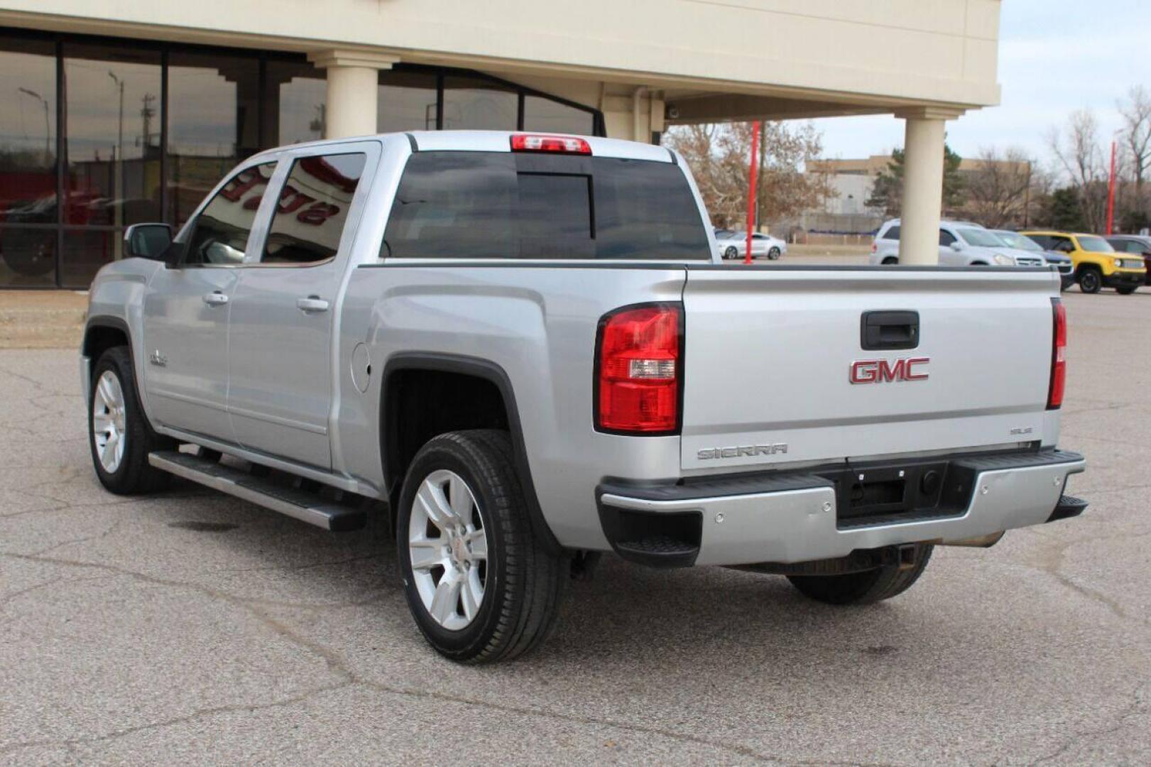 2015 Silver GMC Sierra 1500 SLE Crew Cab Long Box 2WD (3GTP1UEC7FG) with an 5.3L V8 OHV 16V engine, 6-Speed Automatic transmission, located at 4301 NW 39th , Oklahoma City, OK, 73112, (405) 949-5600, 35.512135, -97.598671 - NO DRIVERS LICENCE NO-FULL COVERAGE INSURANCE-NO CREDIT CHECK. COME ON OVER TO SUPERSPORTS AND TAKE A LOOK AND TEST DRIVE. PLEASE GIVE US A CALL AT (405) 949-5600. NO LICENSIA DE MANEJAR- NO SEGURO DE COBERTURA TOTAL- NO VERIFICACCION DE CREDITO. POR FAVOR VENGAN A SUPERSPORTS, - Photo#5