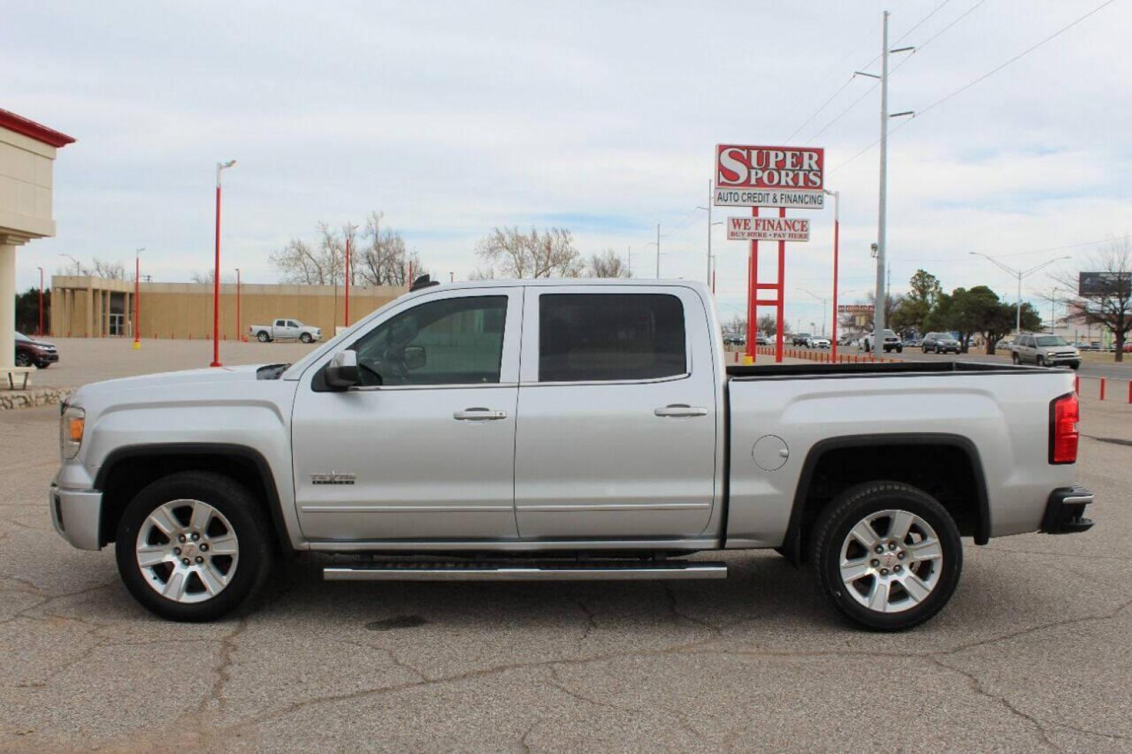 2015 Silver GMC Sierra 1500 SLE Crew Cab Long Box 2WD (3GTP1UEC7FG) with an 5.3L V8 OHV 16V engine, 6-Speed Automatic transmission, located at 4301 NW 39th , Oklahoma City, OK, 73112, (405) 949-5600, 35.512135, -97.598671 - NO DRIVERS LICENCE NO-FULL COVERAGE INSURANCE-NO CREDIT CHECK. COME ON OVER TO SUPERSPORTS AND TAKE A LOOK AND TEST DRIVE. PLEASE GIVE US A CALL AT (405) 949-5600. NO LICENSIA DE MANEJAR- NO SEGURO DE COBERTURA TOTAL- NO VERIFICACCION DE CREDITO. POR FAVOR VENGAN A SUPERSPORTS, - Photo#6