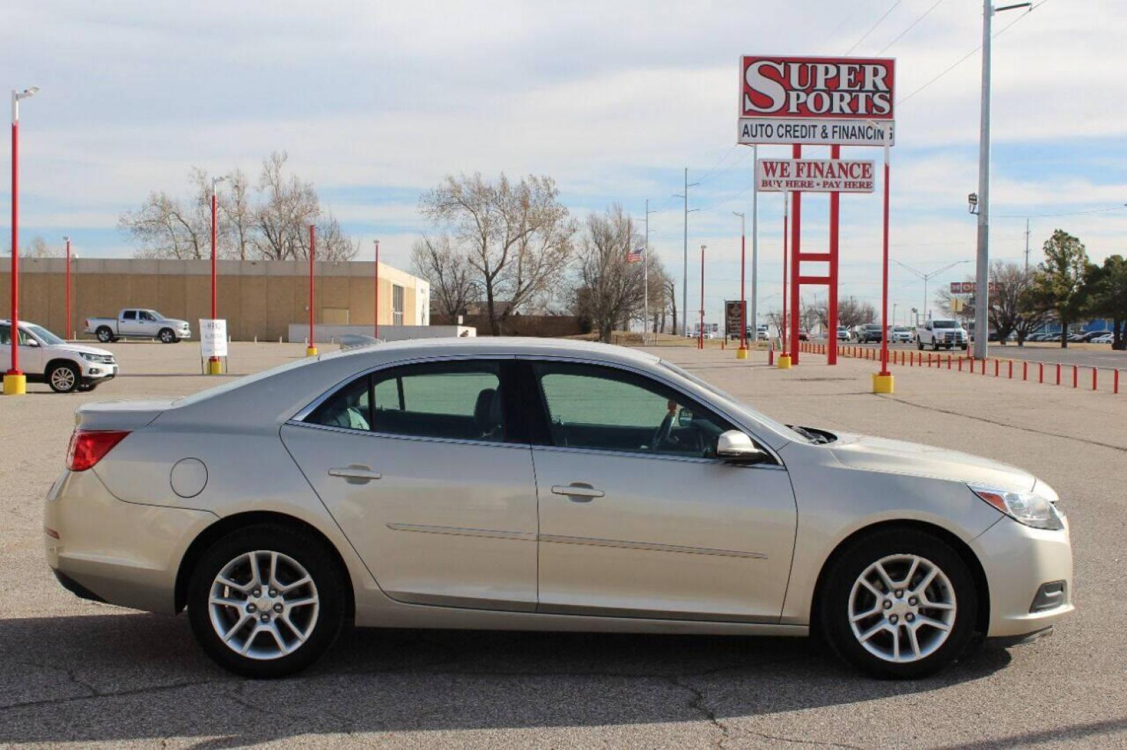 2015 Beige Chevrolet Malibu 1LT (1G11C5SL5FF) with an 2.5L L4 DOHC 16V engine, 6-Speed Automatic transmission, located at 4301 NW 39th , Oklahoma City, OK, 73112, (405) 949-5600, 35.512135, -97.598671 - NO DRIVERS LICENCE NO-FULL COVERAGE INSURANCE-NO CREDIT CHECK. COME ON OVER TO SUPERSPORTS AND TAKE A LOOK AND TEST DRIVE. PLEASE GIVE US A CALL AT (405) 949-5600. NO LICENSIA DE MANEJAR- NO SEGURO DE COBERTURA TOTAL- NO VERIFICACCION DE CREDITO. POR FAVOR VENGAN A SUPERSPORTS, ECHE UN - Photo#3