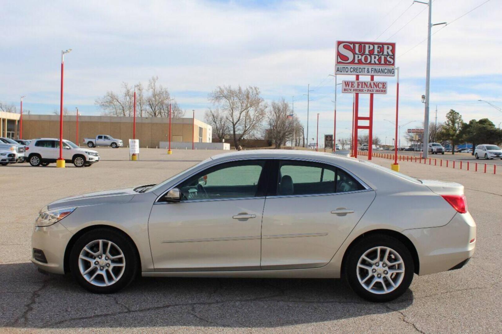 2015 Beige Chevrolet Malibu 1LT (1G11C5SL5FF) with an 2.5L L4 DOHC 16V engine, 6-Speed Automatic transmission, located at 4301 NW 39th , Oklahoma City, OK, 73112, (405) 949-5600, 35.512135, -97.598671 - NO DRIVERS LICENCE NO-FULL COVERAGE INSURANCE-NO CREDIT CHECK. COME ON OVER TO SUPERSPORTS AND TAKE A LOOK AND TEST DRIVE. PLEASE GIVE US A CALL AT (405) 949-5600. NO LICENSIA DE MANEJAR- NO SEGURO DE COBERTURA TOTAL- NO VERIFICACCION DE CREDITO. POR FAVOR VENGAN A SUPERSPORTS, ECHE UN - Photo#6