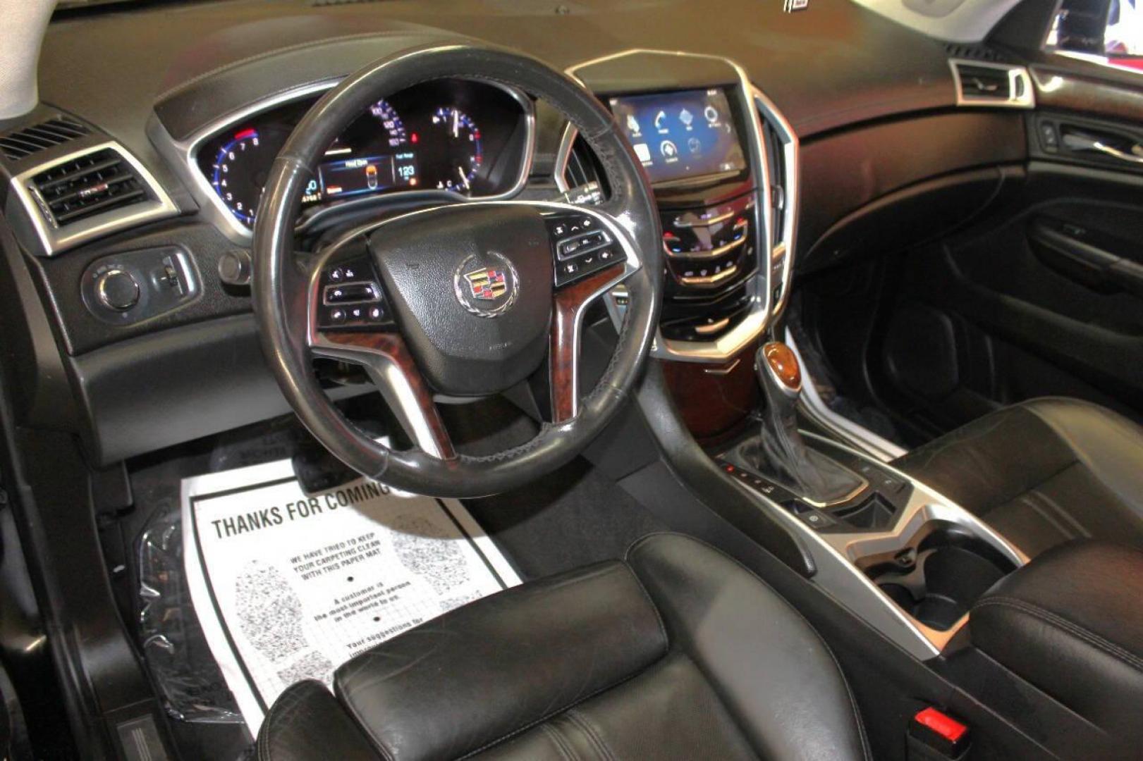 2013 Black Cadillac SRX Premium (3GYFNCE3XDS) with an 3.6L V6 DOHC 24V FFV engine, 6-Speed Automatic transmission, located at 4301 NW 39th , Oklahoma City, OK, 73112, (405) 949-5600, 35.512135, -97.598671 - NO DRIVERS LICENCE NO-FULL COVERAGE INSURANCE-NO CREDIT CHECK. COME ON OVER TO SUPERSPORTS AND TAKE A LOOK AND TEST DRIVE. PLEASE GIVE US A CALL AT (405) 949-5600. NO LICENSIA DE MANEJAR- NO SEGURO DE COBERTURA TOTAL- NO VERIFICACCION DE CREDITO. POR FAVOR VENGAN A SUPERSPORTS, ECHE UN - Photo#15