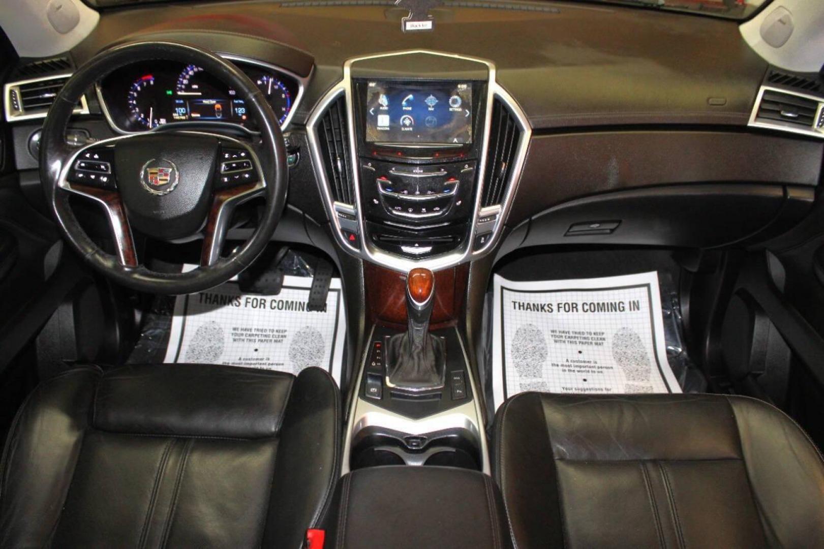 2013 Black Cadillac SRX Premium (3GYFNCE3XDS) with an 3.6L V6 DOHC 24V FFV engine, 6-Speed Automatic transmission, located at 4301 NW 39th , Oklahoma City, OK, 73112, (405) 949-5600, 35.512135, -97.598671 - NO DRIVERS LICENCE NO-FULL COVERAGE INSURANCE-NO CREDIT CHECK. COME ON OVER TO SUPERSPORTS AND TAKE A LOOK AND TEST DRIVE. PLEASE GIVE US A CALL AT (405) 949-5600. NO LICENSIA DE MANEJAR- NO SEGURO DE COBERTURA TOTAL- NO VERIFICACCION DE CREDITO. POR FAVOR VENGAN A SUPERSPORTS, ECHE UN - Photo#17