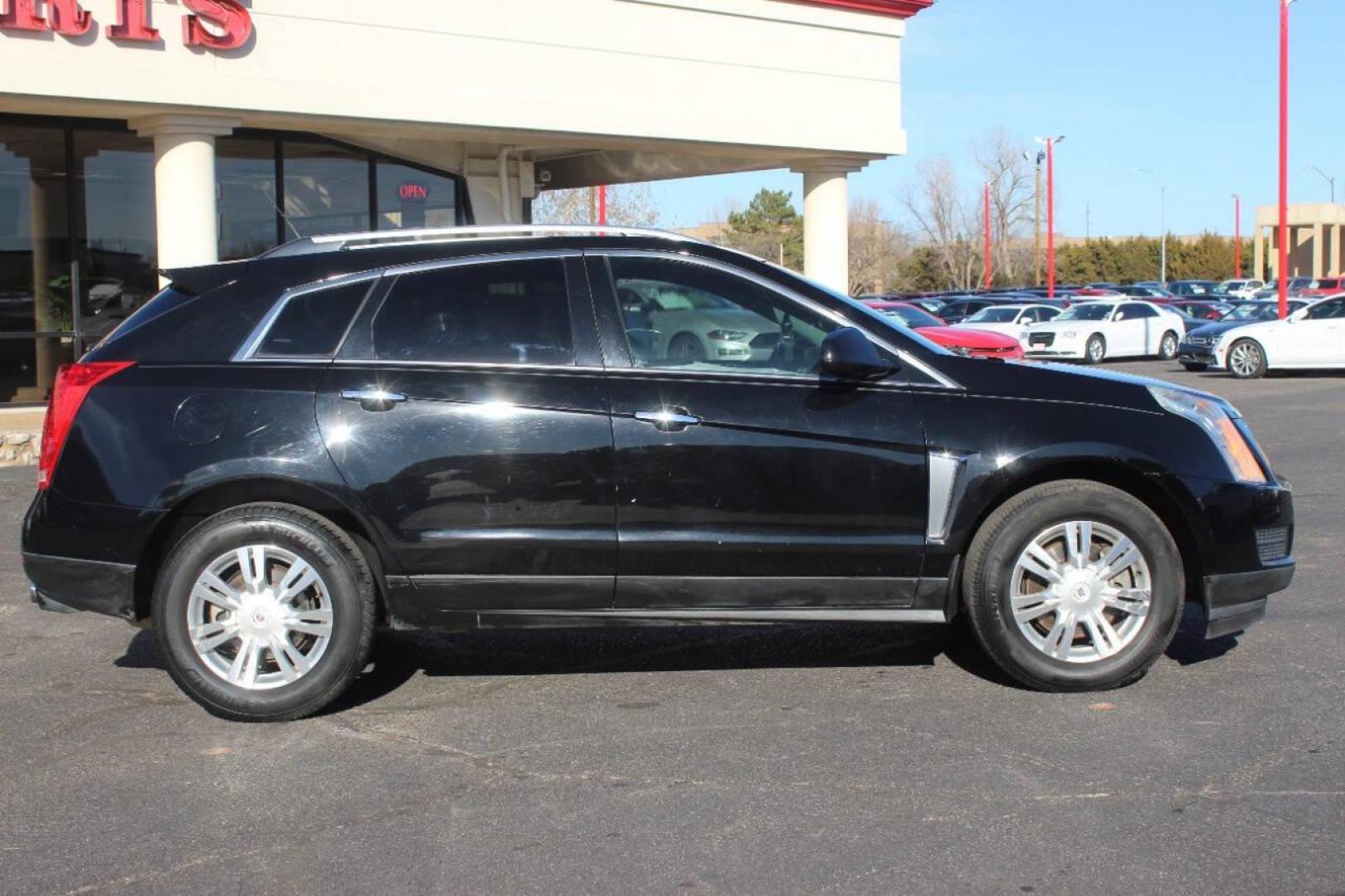 2013 Black Cadillac SRX Premium (3GYFNCE3XDS) with an 3.6L V6 DOHC 24V FFV engine, 6-Speed Automatic transmission, located at 4301 NW 39th , Oklahoma City, OK, 73112, (405) 949-5600, 35.512135, -97.598671 - NO DRIVERS LICENCE NO-FULL COVERAGE INSURANCE-NO CREDIT CHECK. COME ON OVER TO SUPERSPORTS AND TAKE A LOOK AND TEST DRIVE. PLEASE GIVE US A CALL AT (405) 949-5600. NO LICENSIA DE MANEJAR- NO SEGURO DE COBERTURA TOTAL- NO VERIFICACCION DE CREDITO. POR FAVOR VENGAN A SUPERSPORTS, ECHE UN - Photo#2