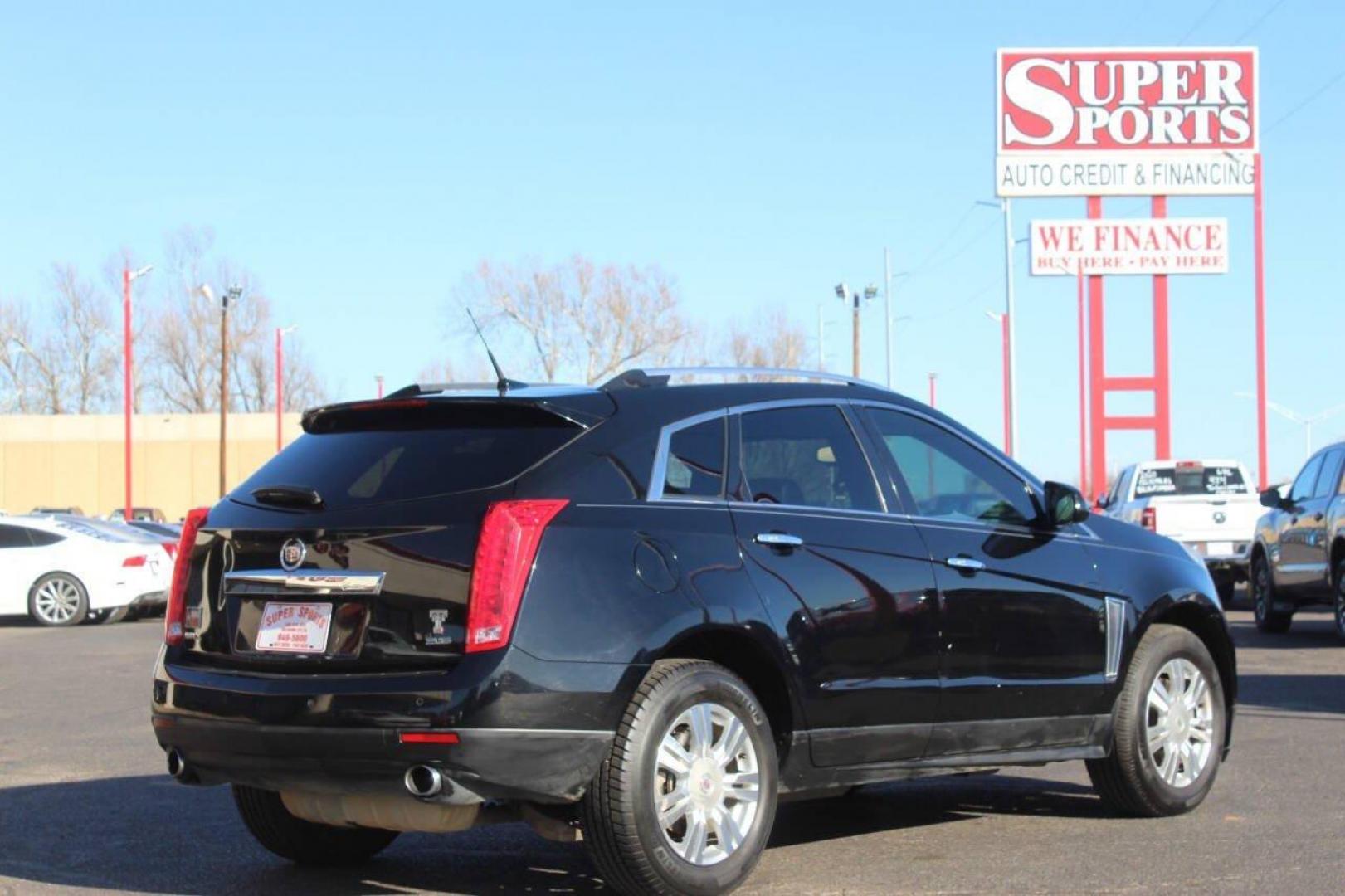 2013 Black Cadillac SRX Premium (3GYFNCE3XDS) with an 3.6L V6 DOHC 24V FFV engine, 6-Speed Automatic transmission, located at 4301 NW 39th , Oklahoma City, OK, 73112, (405) 949-5600, 35.512135, -97.598671 - NO DRIVERS LICENCE NO-FULL COVERAGE INSURANCE-NO CREDIT CHECK. COME ON OVER TO SUPERSPORTS AND TAKE A LOOK AND TEST DRIVE. PLEASE GIVE US A CALL AT (405) 949-5600. NO LICENSIA DE MANEJAR- NO SEGURO DE COBERTURA TOTAL- NO VERIFICACCION DE CREDITO. POR FAVOR VENGAN A SUPERSPORTS, ECHE UN - Photo#3