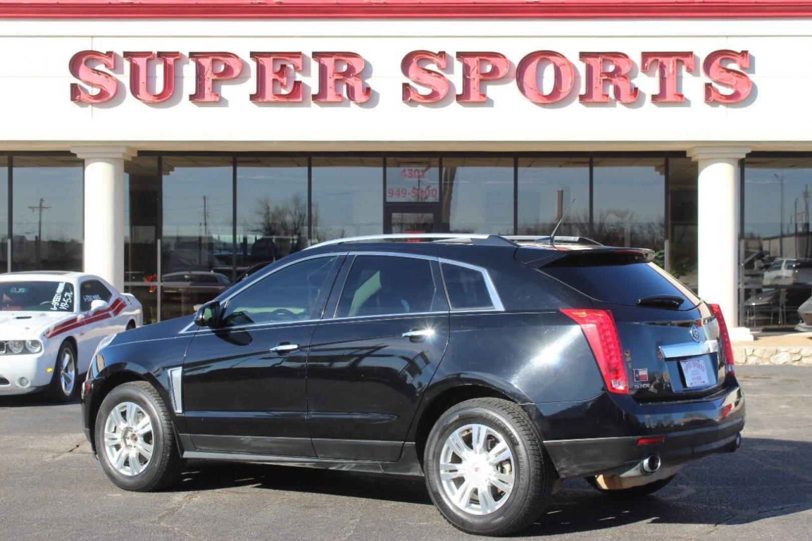 2013 Black Cadillac SRX Premium (3GYFNCE3XDS) with an 3.6L V6 DOHC 24V FFV engine, 6-Speed Automatic transmission, located at 4301 NW 39th , Oklahoma City, OK, 73112, (405) 949-5600, 35.512135, -97.598671 - NO DRIVERS LICENCE NO-FULL COVERAGE INSURANCE-NO CREDIT CHECK. COME ON OVER TO SUPERSPORTS AND TAKE A LOOK AND TEST DRIVE. PLEASE GIVE US A CALL AT (405) 949-5600. NO LICENSIA DE MANEJAR- NO SEGURO DE COBERTURA TOTAL- NO VERIFICACCION DE CREDITO. POR FAVOR VENGAN A SUPERSPORTS, ECHE UN - Photo#4