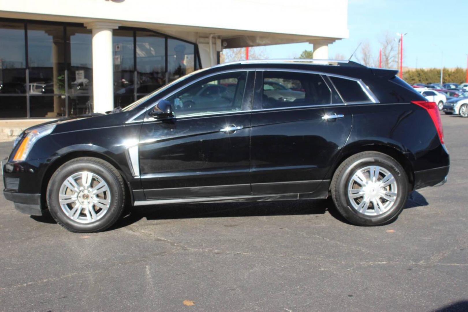 2013 Black Cadillac SRX Premium (3GYFNCE3XDS) with an 3.6L V6 DOHC 24V FFV engine, 6-Speed Automatic transmission, located at 4301 NW 39th , Oklahoma City, OK, 73112, (405) 949-5600, 35.512135, -97.598671 - NO DRIVERS LICENCE NO-FULL COVERAGE INSURANCE-NO CREDIT CHECK. COME ON OVER TO SUPERSPORTS AND TAKE A LOOK AND TEST DRIVE. PLEASE GIVE US A CALL AT (405) 949-5600. NO LICENSIA DE MANEJAR- NO SEGURO DE COBERTURA TOTAL- NO VERIFICACCION DE CREDITO. POR FAVOR VENGAN A SUPERSPORTS, ECHE UN - Photo#5