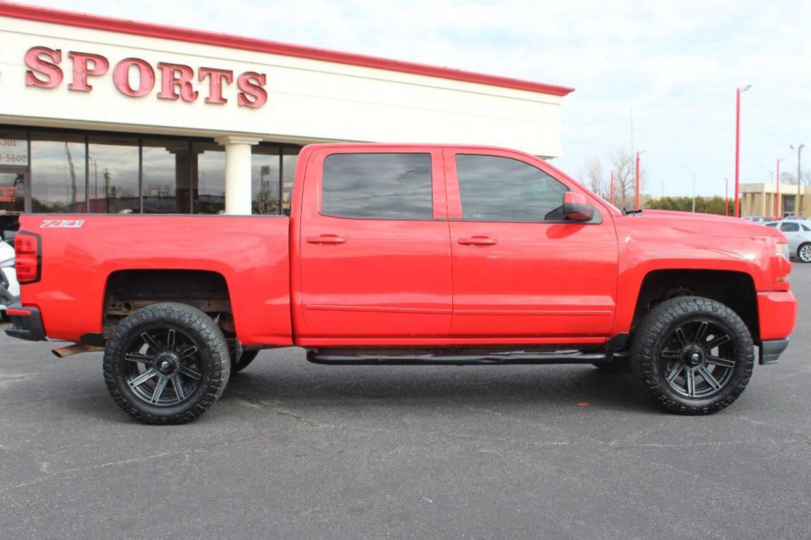 2017 Red Chevrolet Silverado 1500 LT Crew Cab 4WD (3GCUKREC9HG) with an 5.3L V8 OHV 16V engine, 6A transmission, located at 4301 NW 39th , Oklahoma City, OK, 73112, (405) 949-5600, 35.512135, -97.598671 - NO DRIVERS LICENCE NO-FULL COVERAGE INSURANCE-NO CREDIT CHECK. COME ON OVER TO SUPERSPORTS AND TAKE A LOOK AND TEST DRIVE. PLEASE GIVE US A CALL AT (405) 949-5600. NO LICENSIA DE MANEJAR- NO SEGURO DE COBERTURA TOTAL- NO VERIFICACCION DE CREDITO. POR FAVOR VENGAN A SUPERSPORTS, ECHE UN - Photo#2