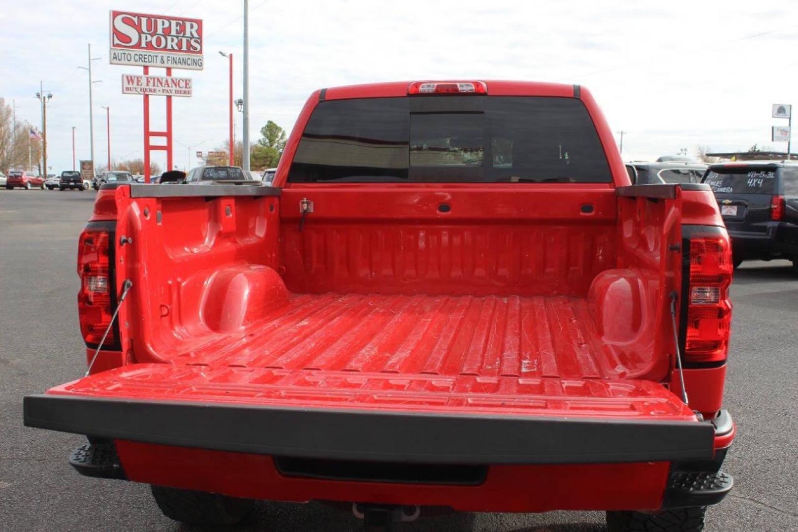 2017 Red Chevrolet Silverado 1500 LT Crew Cab 4WD (3GCUKREC9HG) with an 5.3L V8 OHV 16V engine, 6A transmission, located at 4301 NW 39th , Oklahoma City, OK, 73112, (405) 949-5600, 35.512135, -97.598671 - NO DRIVERS LICENCE NO-FULL COVERAGE INSURANCE-NO CREDIT CHECK. COME ON OVER TO SUPERSPORTS AND TAKE A LOOK AND TEST DRIVE. PLEASE GIVE US A CALL AT (405) 949-5600. NO LICENSIA DE MANEJAR- NO SEGURO DE COBERTURA TOTAL- NO VERIFICACCION DE CREDITO. POR FAVOR VENGAN A SUPERSPORTS, ECHE UN - Photo#4