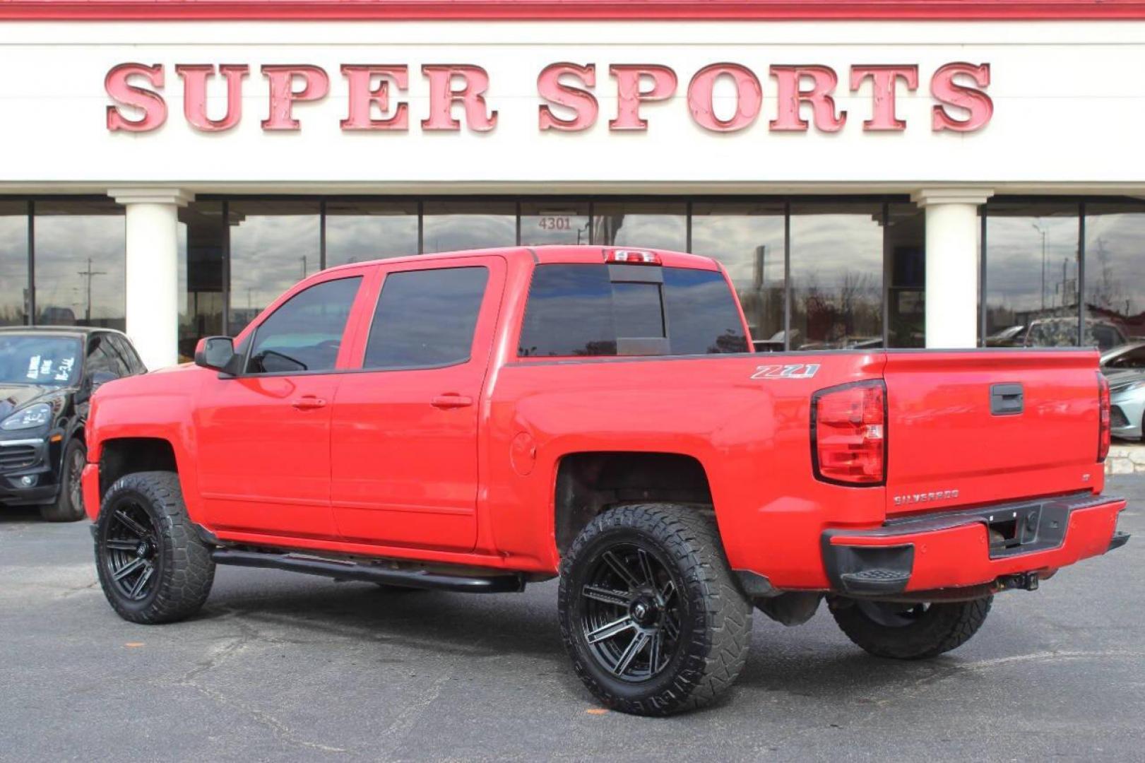 2017 Red Chevrolet Silverado 1500 LT Crew Cab 4WD (3GCUKREC9HG) with an 5.3L V8 OHV 16V engine, 6A transmission, located at 4301 NW 39th , Oklahoma City, OK, 73112, (405) 949-5600, 35.512135, -97.598671 - NO DRIVERS LICENCE NO-FULL COVERAGE INSURANCE-NO CREDIT CHECK. COME ON OVER TO SUPERSPORTS AND TAKE A LOOK AND TEST DRIVE. PLEASE GIVE US A CALL AT (405) 949-5600. NO LICENSIA DE MANEJAR- NO SEGURO DE COBERTURA TOTAL- NO VERIFICACCION DE CREDITO. POR FAVOR VENGAN A SUPERSPORTS, ECHE UN - Photo#5