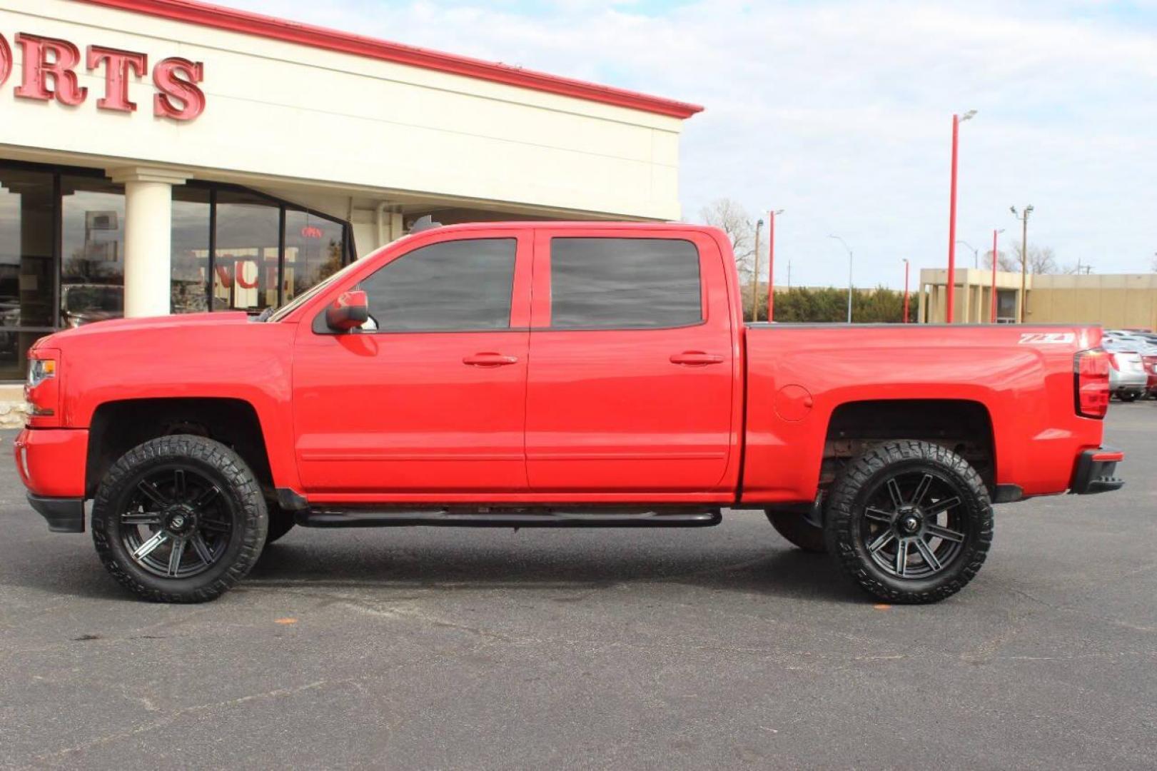 2017 Red Chevrolet Silverado 1500 LT Crew Cab 4WD (3GCUKREC9HG) with an 5.3L V8 OHV 16V engine, 6A transmission, located at 4301 NW 39th , Oklahoma City, OK, 73112, (405) 949-5600, 35.512135, -97.598671 - NO DRIVERS LICENCE NO-FULL COVERAGE INSURANCE-NO CREDIT CHECK. COME ON OVER TO SUPERSPORTS AND TAKE A LOOK AND TEST DRIVE. PLEASE GIVE US A CALL AT (405) 949-5600. NO LICENSIA DE MANEJAR- NO SEGURO DE COBERTURA TOTAL- NO VERIFICACCION DE CREDITO. POR FAVOR VENGAN A SUPERSPORTS, ECHE UN - Photo#6