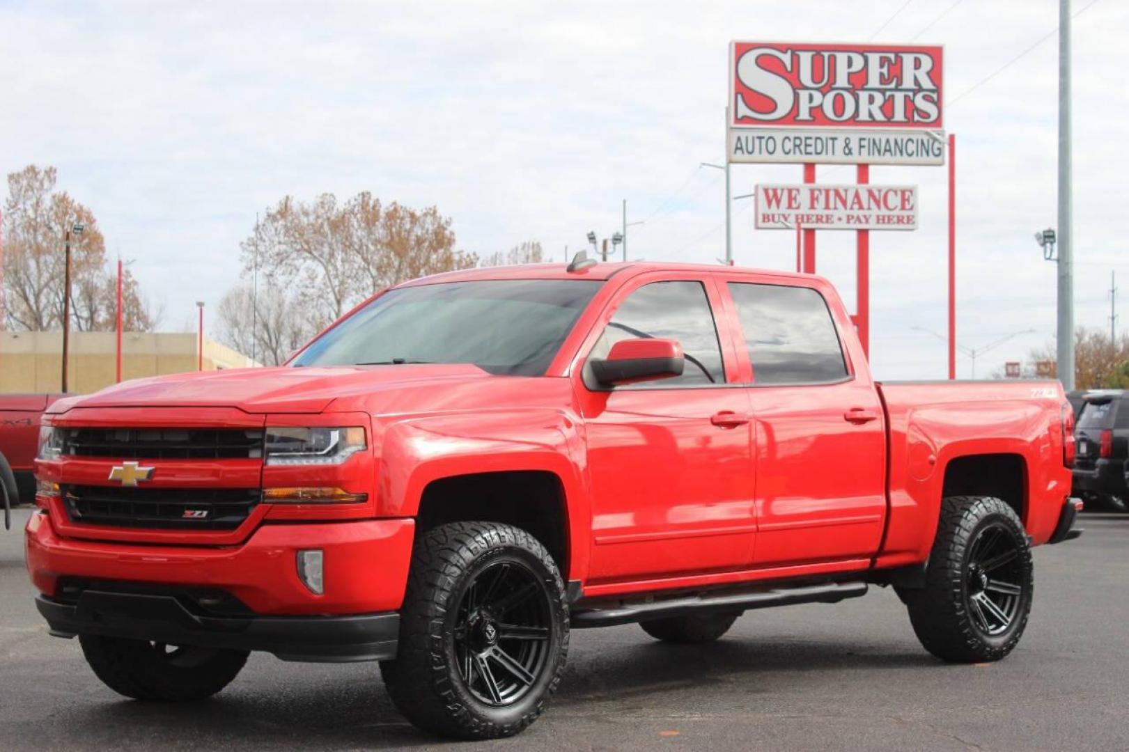 2017 Red Chevrolet Silverado 1500 LT Crew Cab 4WD (3GCUKREC9HG) with an 5.3L V8 OHV 16V engine, 6A transmission, located at 4301 NW 39th , Oklahoma City, OK, 73112, (405) 949-5600, 35.512135, -97.598671 - NO DRIVERS LICENCE NO-FULL COVERAGE INSURANCE-NO CREDIT CHECK. COME ON OVER TO SUPERSPORTS AND TAKE A LOOK AND TEST DRIVE. PLEASE GIVE US A CALL AT (405) 949-5600. NO LICENSIA DE MANEJAR- NO SEGURO DE COBERTURA TOTAL- NO VERIFICACCION DE CREDITO. POR FAVOR VENGAN A SUPERSPORTS, ECHE UN - Photo#7