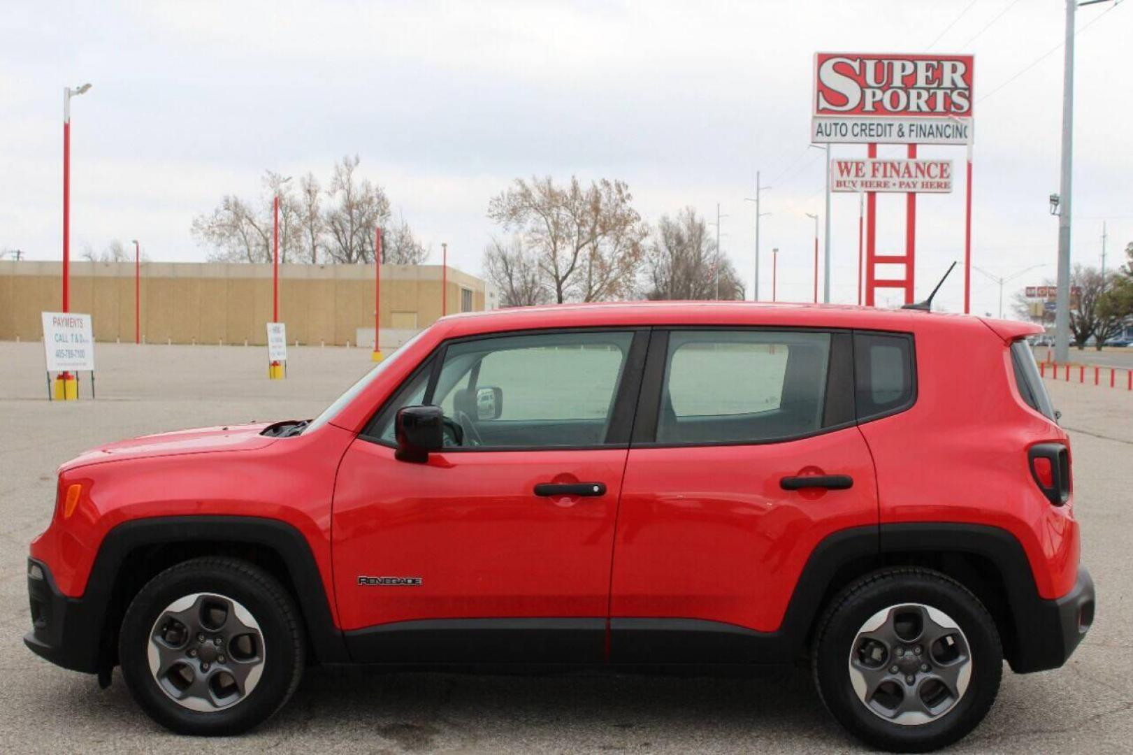 2015 Red Jeep Renegade Sport FWD (ZACCJAAT0FP) with an 2.4L L4 engine, 6-Speed Manual transmission, located at 4301 NW 39th , Oklahoma City, OK, 73112, (405) 949-5600, 35.512135, -97.598671 - NO DRIVERS LICENCE NO-FULL COVERAGE INSURANCE-NO CREDIT CHECK. COME ON OVER TO SUPERSPORTS AND TAKE A LOOK AND TEST DRIVE. PLEASE GIVE US A CALL AT (405) 949-5600. NO LICENSIA DE MANEJAR- NO SEGURO DE COBERTURA TOTAL- NO VERIFICACCION DE CREDITO. POR FAVOR VENGAN A SUPERSPORTS, ECHE UN - Photo#5