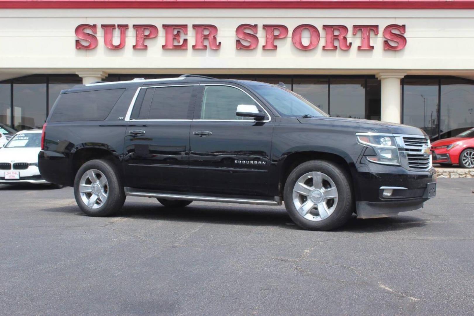 2015 Black Chevrolet Suburban LTZ 1500 4WD (1GNSKKKC3FR) with an 5.3L V8 OHV 16V engine, 6-Speed Automatic transmission, located at 4301 NW 39th , Oklahoma City, OK, 73112, (405) 949-5600, 35.512135, -97.598671 - NO DRIVERS LICENCE NO-FULL COVERAGE INSURANCE-NO CREDIT CHECK. COME ON OVER TO SUPERSPORTS AND TAKE A LOOK AND TEST DRIVE. PLEASE GIVE US A CALL AT (405) 949-5600. NO LICENSIA DE MANEJAR- NO SEGURO DE COBERTURA TOTAL- NO VERIFICACCION DE CREDITO. POR FAVOR VENGAN A SUPERSPORTS, ECHE UN - Photo#0