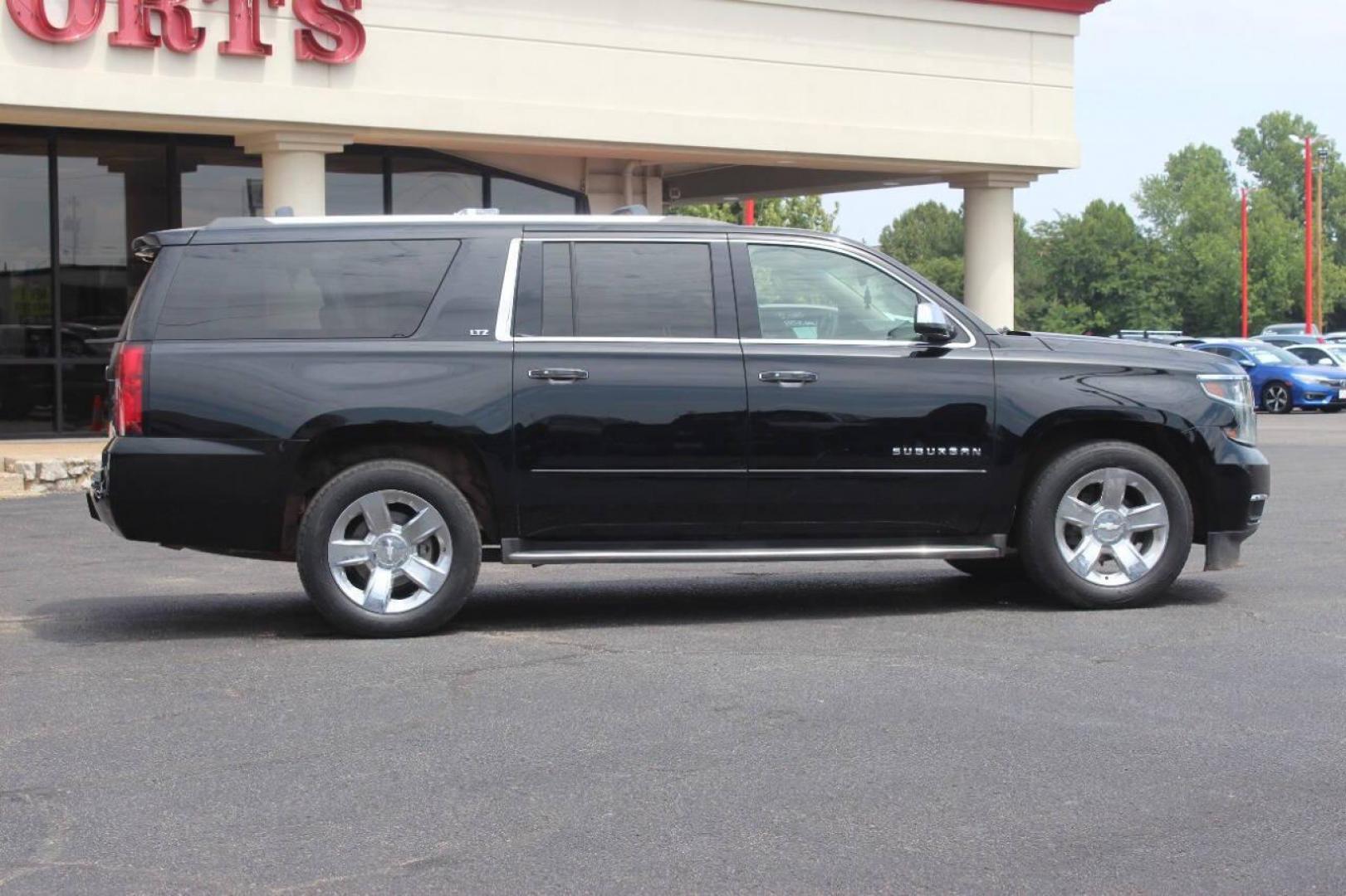 2015 Black Chevrolet Suburban LTZ 1500 4WD (1GNSKKKC3FR) with an 5.3L V8 OHV 16V engine, 6-Speed Automatic transmission, located at 4301 NW 39th , Oklahoma City, OK, 73112, (405) 949-5600, 35.512135, -97.598671 - NO DRIVERS LICENCE NO-FULL COVERAGE INSURANCE-NO CREDIT CHECK. COME ON OVER TO SUPERSPORTS AND TAKE A LOOK AND TEST DRIVE. PLEASE GIVE US A CALL AT (405) 949-5600. NO LICENSIA DE MANEJAR- NO SEGURO DE COBERTURA TOTAL- NO VERIFICACCION DE CREDITO. POR FAVOR VENGAN A SUPERSPORTS, ECHE UN - Photo#2