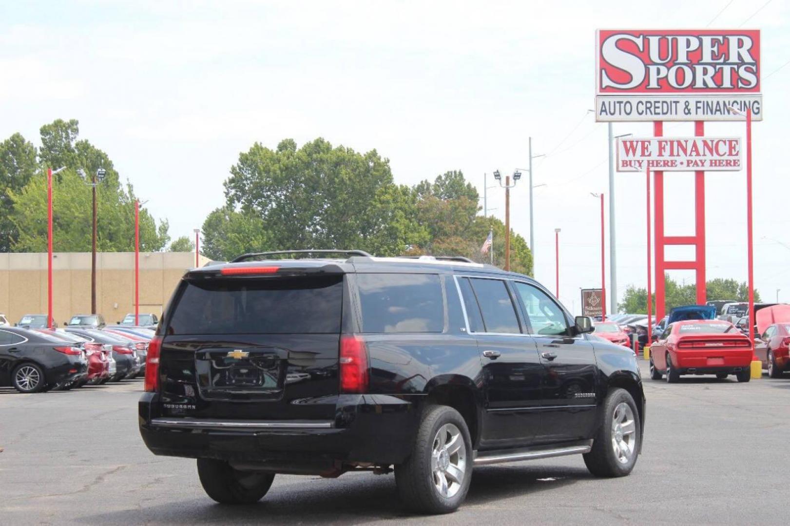 2015 Black Chevrolet Suburban LTZ 1500 4WD (1GNSKKKC3FR) with an 5.3L V8 OHV 16V engine, 6-Speed Automatic transmission, located at 4301 NW 39th , Oklahoma City, OK, 73112, (405) 949-5600, 35.512135, -97.598671 - NO DRIVERS LICENCE NO-FULL COVERAGE INSURANCE-NO CREDIT CHECK. COME ON OVER TO SUPERSPORTS AND TAKE A LOOK AND TEST DRIVE. PLEASE GIVE US A CALL AT (405) 949-5600. NO LICENSIA DE MANEJAR- NO SEGURO DE COBERTURA TOTAL- NO VERIFICACCION DE CREDITO. POR FAVOR VENGAN A SUPERSPORTS, ECHE UN - Photo#3