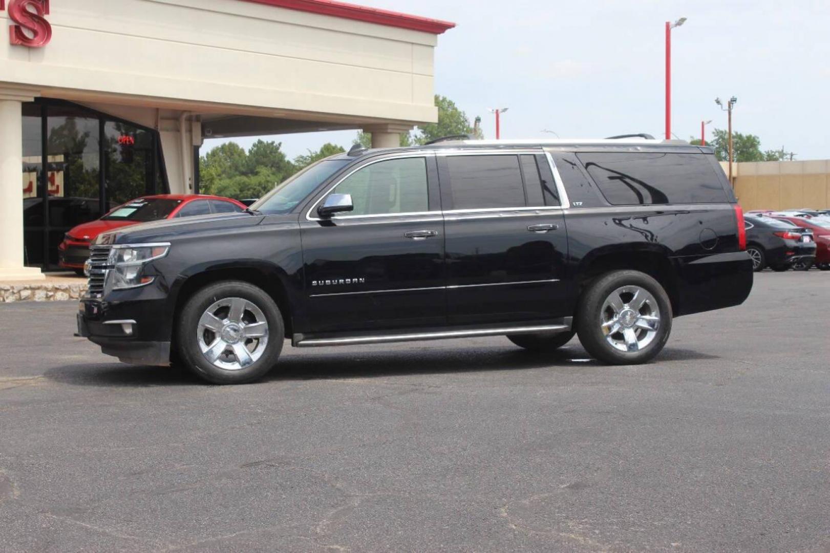 2015 Black Chevrolet Suburban LTZ 1500 4WD (1GNSKKKC3FR) with an 5.3L V8 OHV 16V engine, 6-Speed Automatic transmission, located at 4301 NW 39th , Oklahoma City, OK, 73112, (405) 949-5600, 35.512135, -97.598671 - NO DRIVERS LICENCE NO-FULL COVERAGE INSURANCE-NO CREDIT CHECK. COME ON OVER TO SUPERSPORTS AND TAKE A LOOK AND TEST DRIVE. PLEASE GIVE US A CALL AT (405) 949-5600. NO LICENSIA DE MANEJAR- NO SEGURO DE COBERTURA TOTAL- NO VERIFICACCION DE CREDITO. POR FAVOR VENGAN A SUPERSPORTS, ECHE UN - Photo#5