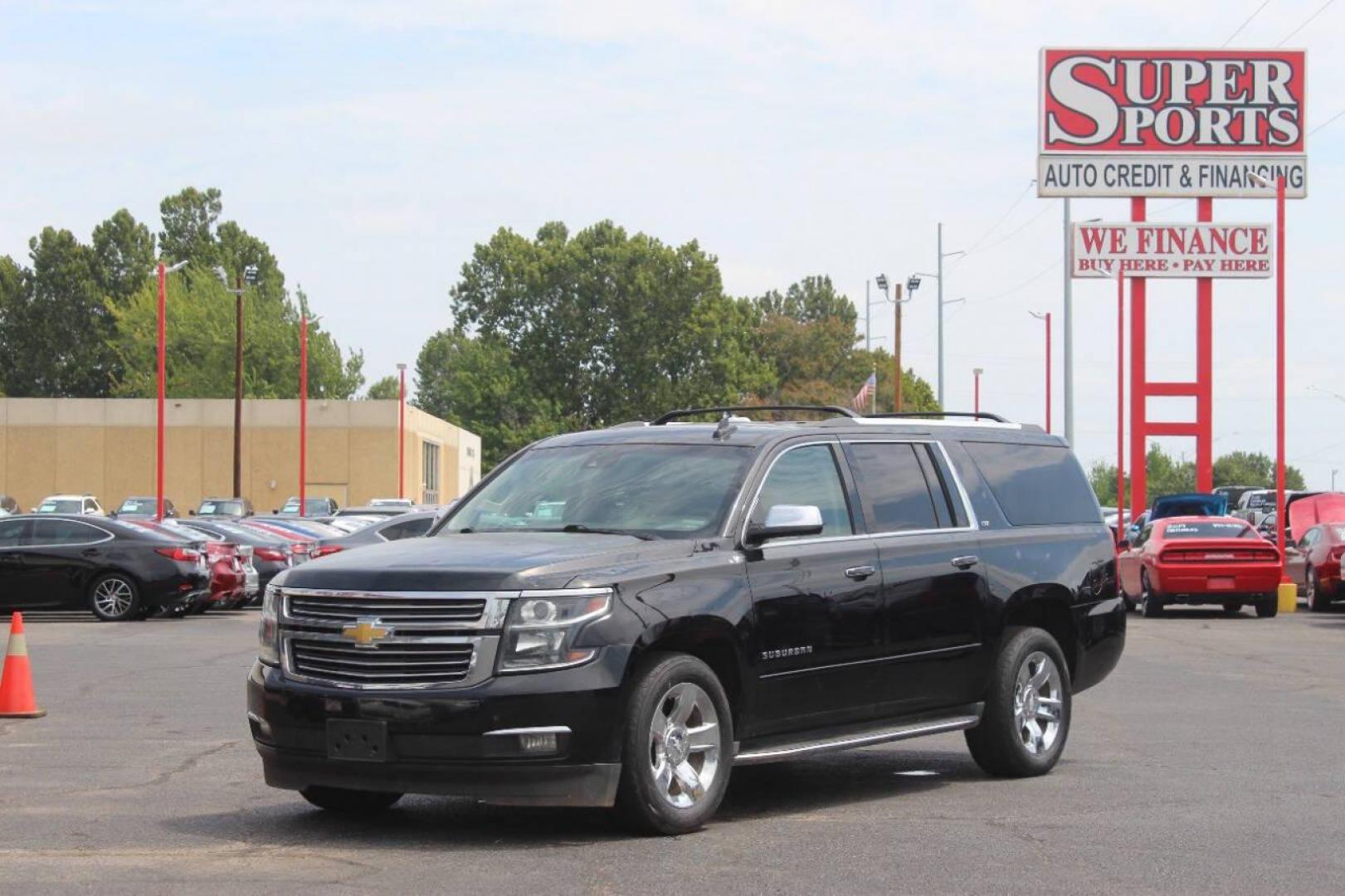 2015 Black Chevrolet Suburban LTZ 1500 4WD (1GNSKKKC3FR) with an 5.3L V8 OHV 16V engine, 6-Speed Automatic transmission, located at 4301 NW 39th , Oklahoma City, OK, 73112, (405) 949-5600, 35.512135, -97.598671 - NO DRIVERS LICENCE NO-FULL COVERAGE INSURANCE-NO CREDIT CHECK. COME ON OVER TO SUPERSPORTS AND TAKE A LOOK AND TEST DRIVE. PLEASE GIVE US A CALL AT (405) 949-5600. NO LICENSIA DE MANEJAR- NO SEGURO DE COBERTURA TOTAL- NO VERIFICACCION DE CREDITO. POR FAVOR VENGAN A SUPERSPORTS, ECHE UN - Photo#6