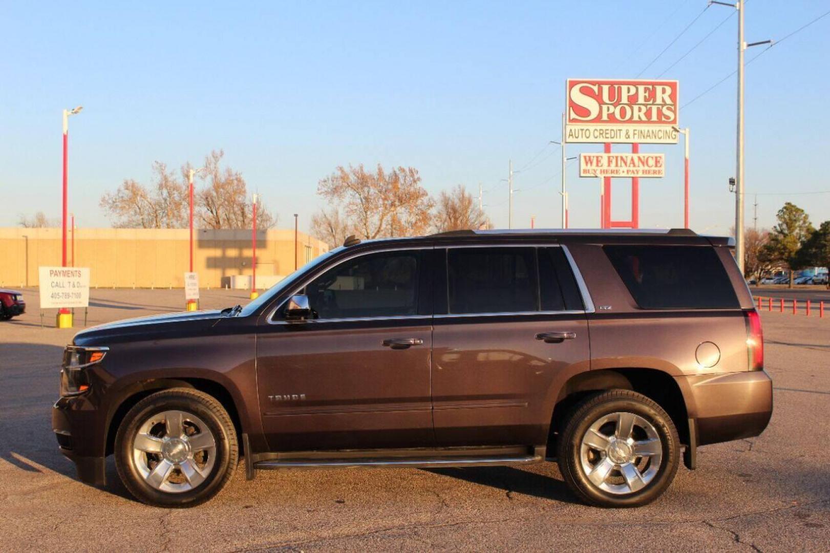 2015 Pewter Chevrolet Tahoe LTZ 4WD (1GNSKCKC6FR) with an 5.3L V8 OHV 16V engine, 6-Speed Automatic transmission, located at 4301 NW 39th , Oklahoma City, OK, 73112, (405) 949-5600, 35.512135, -97.598671 - NO DRIVERS LICENCE NO-FULL COVERAGE INSURANCE-NO CREDIT CHECK. COME ON OVER TO SUPERSPORTS AND TAKE A LOOK AND TEST DRIVE. PLEASE GIVE US A CALL AT (405) 949-5600. NO LICENSIA DE MANEJAR- NO SEGURO DE COBERTURA TOTAL- NO VERIFICACCION DE CREDITO. POR FAVOR VENGAN A SUPERSPORTS, ECHE UN - Photo#0