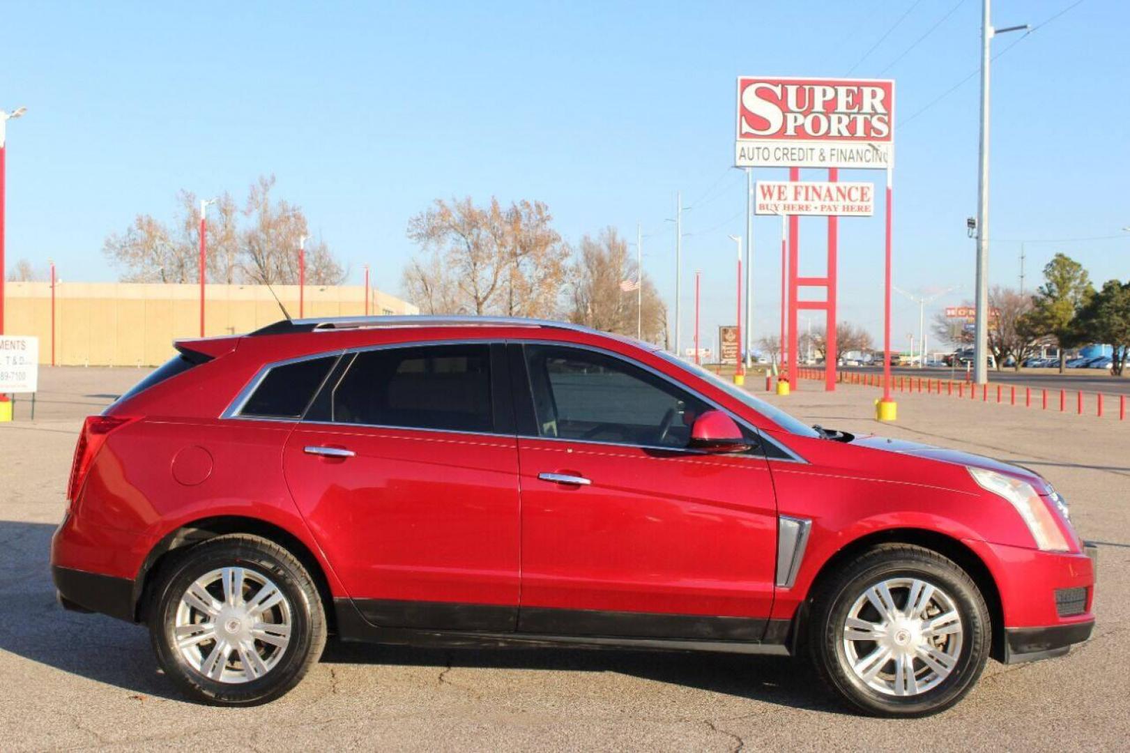 2013 Red Cadillac SRX Premium (3GYFNCE30DS) with an 3.6L V6 DOHC 24V FFV engine, 6-Speed Automatic transmission, located at 4301 NW 39th , Oklahoma City, OK, 73112, (405) 949-5600, 35.512135, -97.598671 - NO DRIVERS LICENSE - NO FULL COVERAGE INSURANCE - NO CREDIT CHECK. COME ON OVER TO SUPERSPORTS AND TAKE A LOOK AND TEST DRIVE PLEASE GIVE US A CALL AT (405) 949-5600. NO LICENCIA DE MANEJAR - NO SEGURO DE COBERTURA TOTAL - NO VERIFICACION DE CREDITO. POR FAVOR VENGAN A SUPERSPORTS, EC - Photo#3