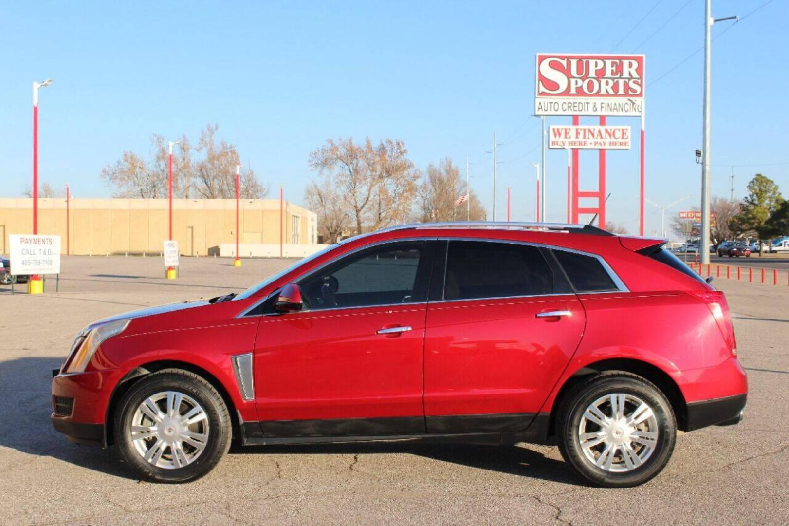 2013 Red Cadillac SRX Premium (3GYFNCE30DS) with an 3.6L V6 DOHC 24V FFV engine, 6-Speed Automatic transmission, located at 4301 NW 39th , Oklahoma City, OK, 73112, (405) 949-5600, 35.512135, -97.598671 - NO DRIVERS LICENSE - NO FULL COVERAGE INSURANCE - NO CREDIT CHECK. COME ON OVER TO SUPERSPORTS AND TAKE A LOOK AND TEST DRIVE PLEASE GIVE US A CALL AT (405) 949-5600. NO LICENCIA DE MANEJAR - NO SEGURO DE COBERTURA TOTAL - NO VERIFICACION DE CREDITO. POR FAVOR VENGAN A SUPERSPORTS, EC - Photo#6