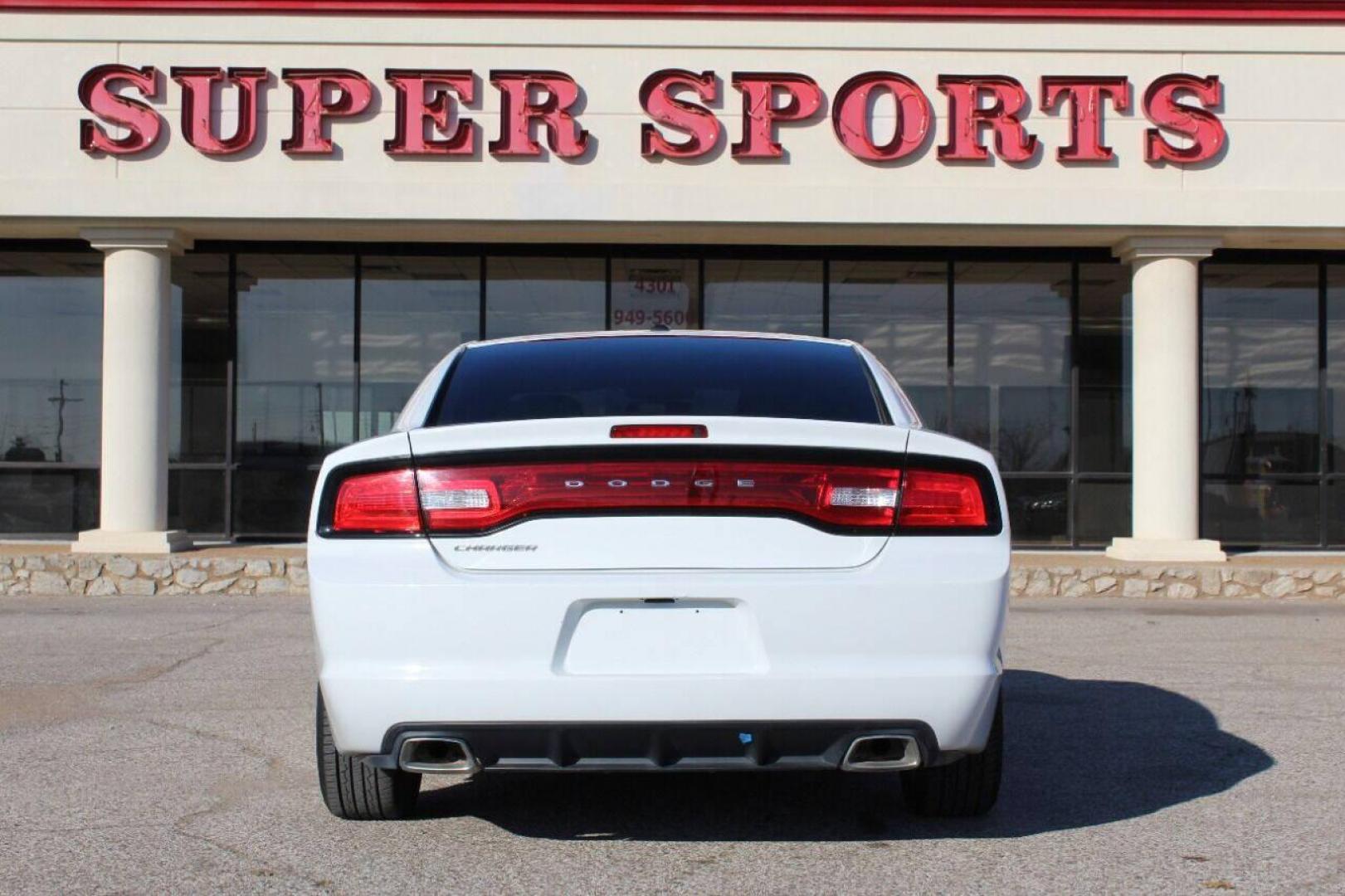 2013 White Dodge Charger SE (2C3CDXBG5DH) with an 3.6L V6 DOHC 24V engine, 5-Speed Automatic transmission, located at 4301 NW 39th , Oklahoma City, OK, 73112, (405) 949-5600, 35.512135, -97.598671 - NO DRIVERS LICENCE NO-FULL COVERAGE INSURANCE-NO CREDIT CHECK. COME ON OVER TO SUPERSPORTS AND TAKE A LOOK AND TEST DRIVE PLEASE GIVE US A CALL AT (405) 949-5600. NO LICENSIA DE MANEJAR- NO SEGURO DE COBERTURA TOTAL- NO VERIFICACCION DE CREDITO. POR FAVOR VENGAN A SUPERSPORTS, ECHE - Photo#4