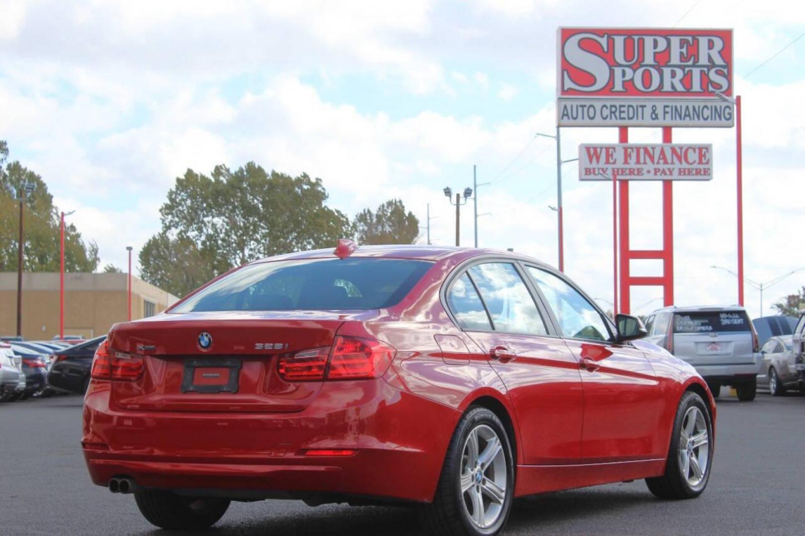 2013 Red BMW 3-Series 328i xDrive Sedan (WBA3B3G56DN) with an 2.0L L4 DOHC 16V engine, Automatic 8-Speed transmission, located at 4301 NW 39th , Oklahoma City, OK, 73112, (405) 949-5600, 35.512135, -97.598671 - NO DRIVERS LICENCE NO-FULL COVERAGE INSURANCE-NO CREDIT CHECK. COME ON OVER TO SUPERSPORTS AND TAKE A LOOK AND TEST DRIVE. PLEASE GIVE US A CALL AT (405) 949-5600. NO LICENSIA DE MANEJAR- NO SEGURO DE COBERTURA TOTAL- NO VERIFICACCION DE CREDITO. POR FAVOR VENGAN A SUPERSPORTS, ECHE UN - Photo#3