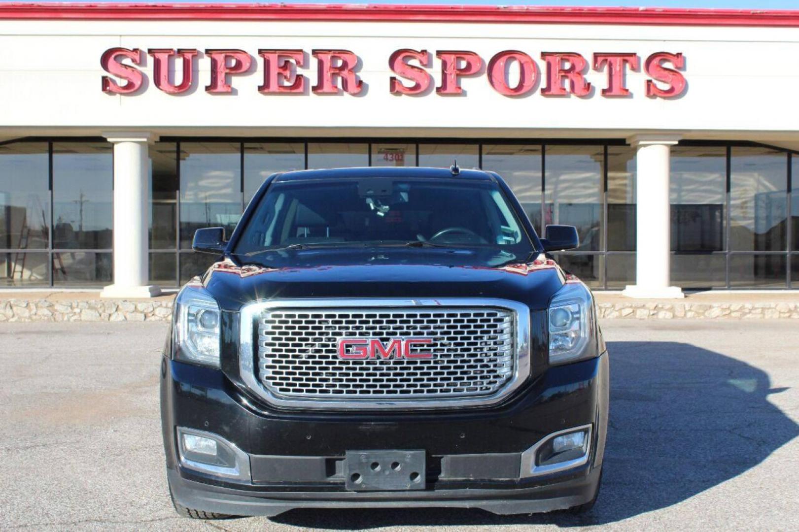 2015 Black GMC Yukon Denali XL 4WD (1GKS2JKJ5FR) with an 6.2L V8 OHV 16V engine, 6-Speed Automatic transmission, located at 4301 NW 39th , Oklahoma City, OK, 73112, (405) 949-5600, 35.512135, -97.598671 - NO DRIVERS LICENCE NO-FULL COVERAGE INSURANCE-NO CREDIT CHECK. COME ON OVER TO SUPERSPORTS AND TAKE A LOOK AND TEST DRIVE. PLEASE GIVE US A CALL AT (405) 949-5600. NO LICENSIA DE MANEJAR- NO SEGURO DE COBERTURA TOTAL- NO VERIFICACION DE CREDITO. POR FAVOR VENGAN A SUPERSPORTS, ECHE UN V - Photo#2