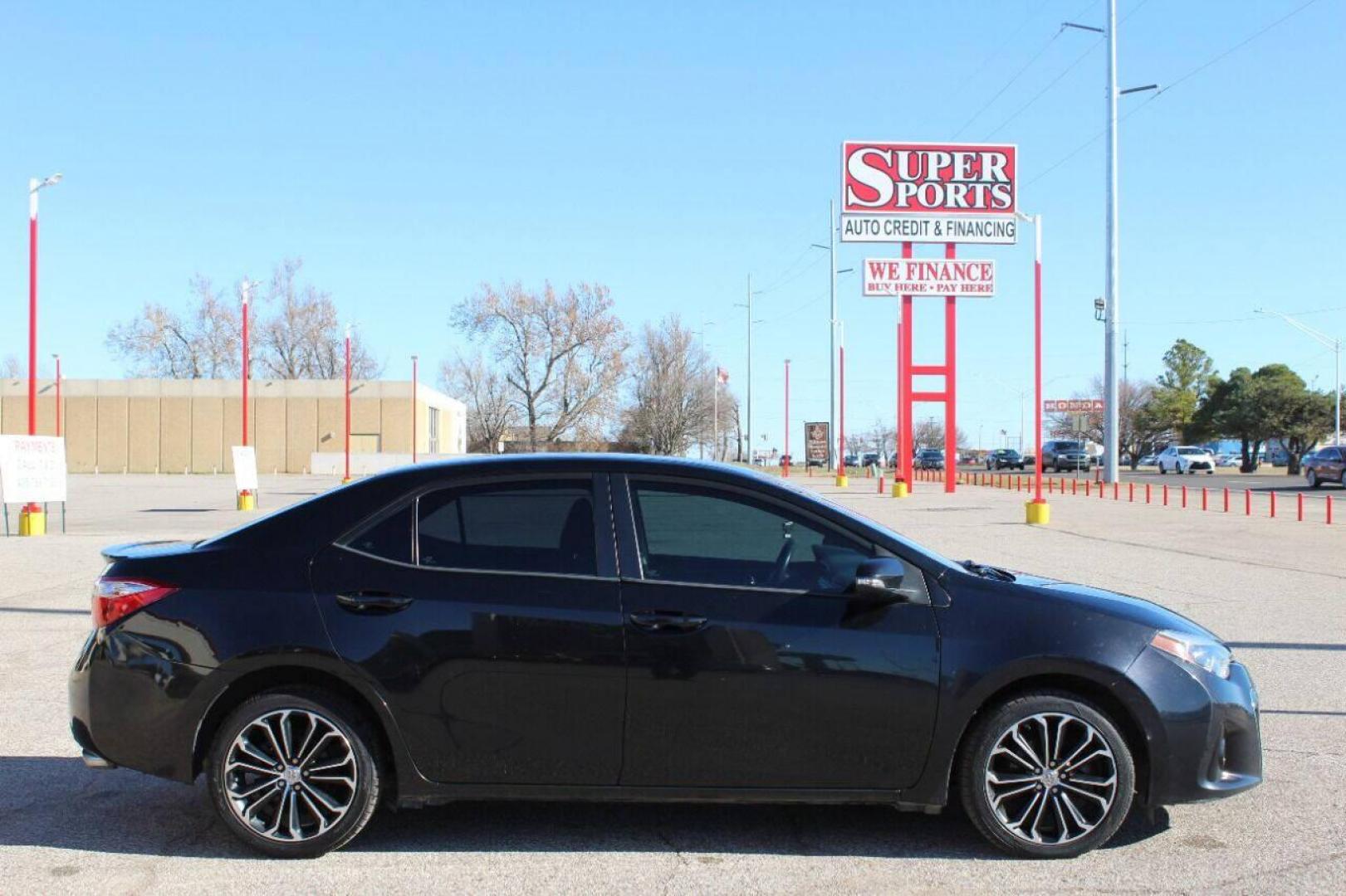 2015 Black Toyota Corolla L 4-Speed AT (2T1BURHE5FC) with an 1.8L L4 DOHC 16V engine, 4-Speed Automatic transmission, located at 4301 NW 39th , Oklahoma City, OK, 73112, (405) 949-5600, 35.512135, -97.598671 - NO DRIVERS LICENCE NO - FULL COVERAGE INSURANCE - NO CREDIT CHECK COME ON OVER TO SUPERSPORTS AND TAKE A LOOK AND TEST DRIVE PLEASE GIVE US A CALL AT (405) 949-5600 NO LICENCIA DE MANEJAR - NO SEGURO DE COBERTURA TOTAL - NO VERIFICACION DE CREDITO POR FAVOR VENGAN A SUPERSPORTS, ECHE UN - Photo#3