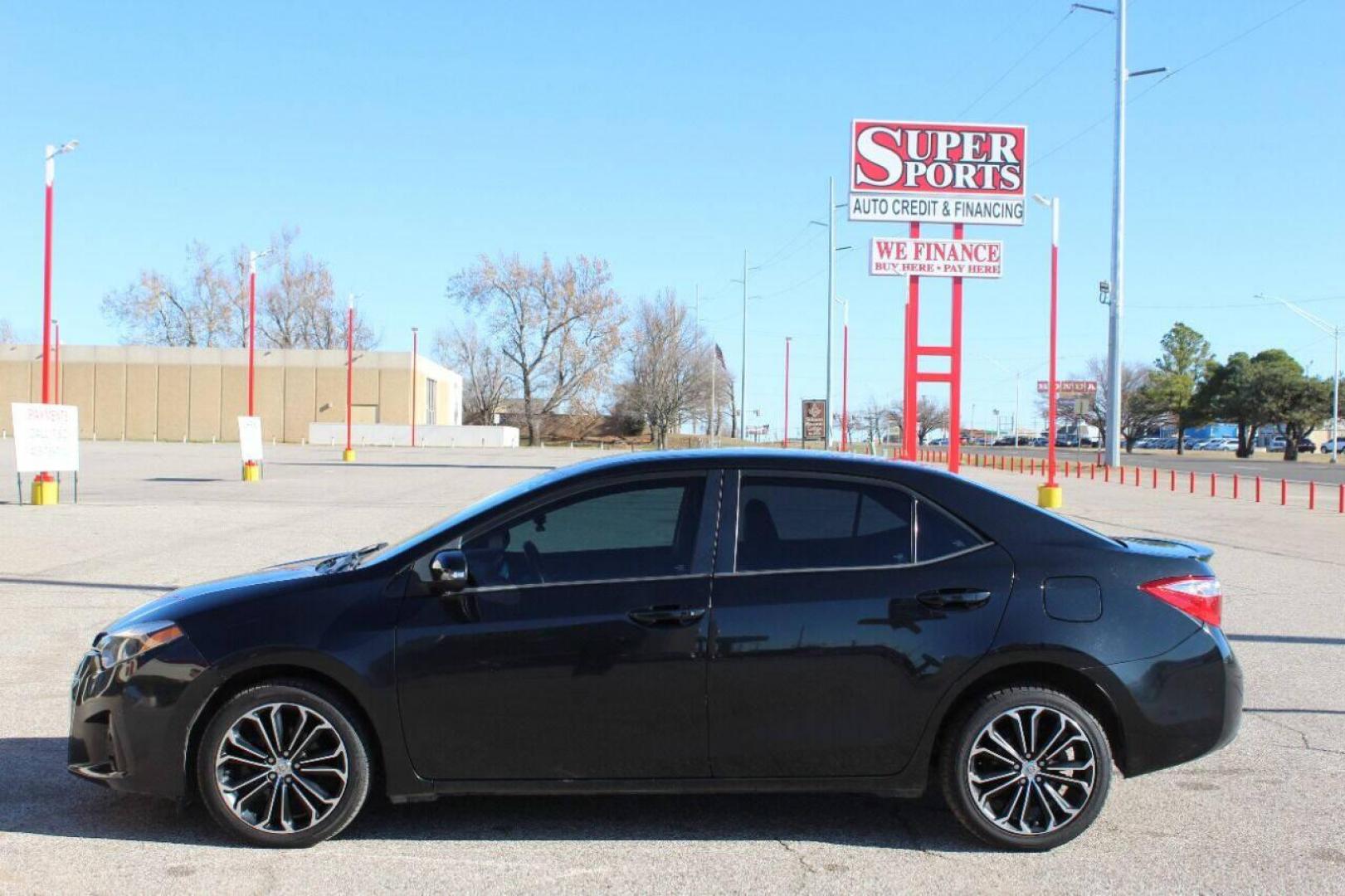 2015 Black Toyota Corolla L 4-Speed AT (2T1BURHE5FC) with an 1.8L L4 DOHC 16V engine, 4-Speed Automatic transmission, located at 4301 NW 39th , Oklahoma City, OK, 73112, (405) 949-5600, 35.512135, -97.598671 - NO DRIVERS LICENCE NO - FULL COVERAGE INSURANCE - NO CREDIT CHECK COME ON OVER TO SUPERSPORTS AND TAKE A LOOK AND TEST DRIVE PLEASE GIVE US A CALL AT (405) 949-5600 NO LICENCIA DE MANEJAR - NO SEGURO DE COBERTURA TOTAL - NO VERIFICACION DE CREDITO POR FAVOR VENGAN A SUPERSPORTS, ECHE UN - Photo#6