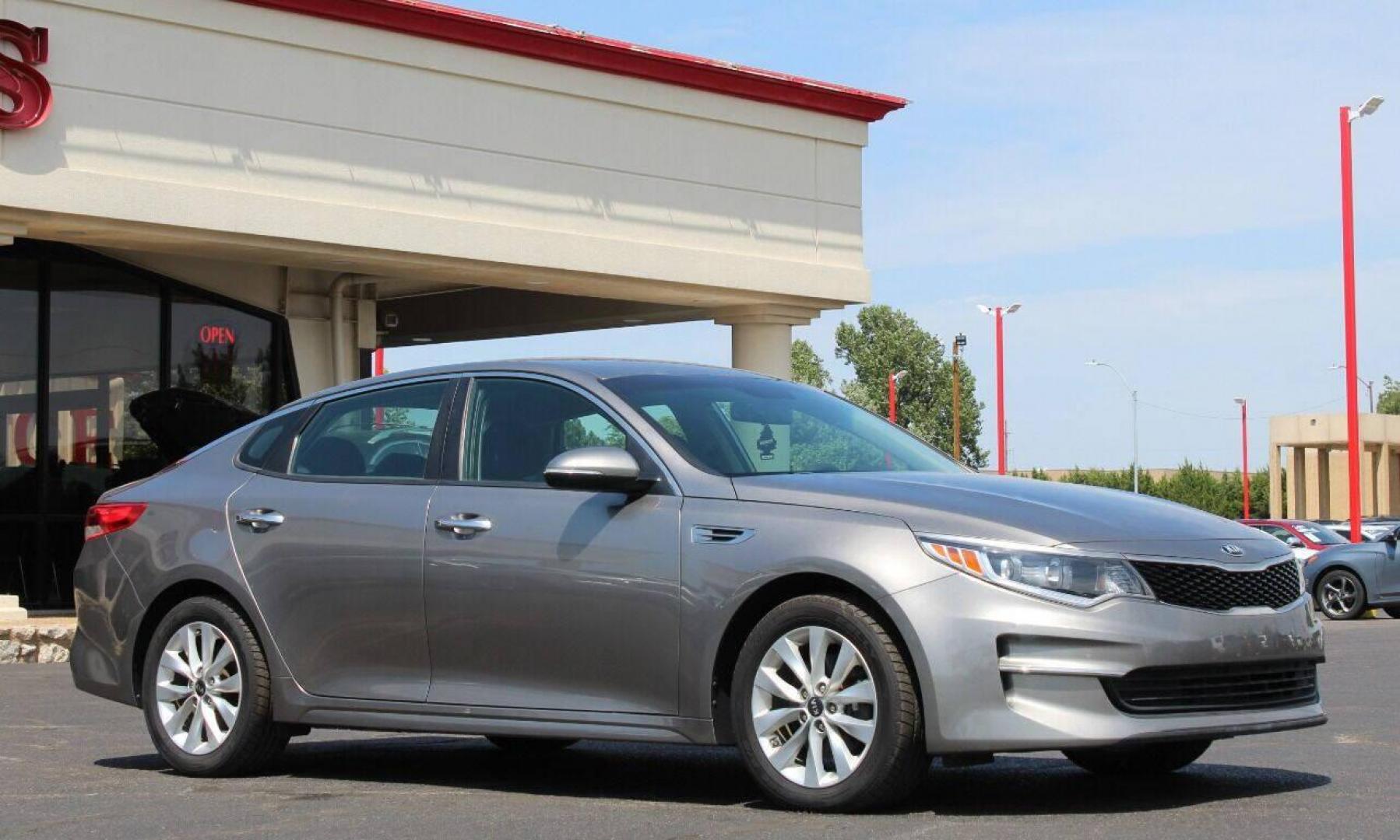 2017 Tan Kia Optima LX (5XXGT4L30HG) with an 2.4L L4 DOHC 16V engine, 6A transmission, located at 4301 NW 39th , Oklahoma City, OK, 73112, (405) 949-5600, 35.512135, -97.598671 - NO DRIVERS LICENCE NO-FULL COVERAGE INSURANCE-NO CREDIT CHECK. COME ON OVER TO SUPERSPORTS AND TAKE A LOOK AND TEST DRIVE. PLEASE GIVE US A CALL AT (405) 949-5600. NO LICENSIA DE MANEJAR- NO SEGURO DE COBERTURA TOTAL- NO VERIFICACCION DE CREDITO. POR FAVOR VENGAN A SUPERSPORTS, ECHE UN - Photo#0