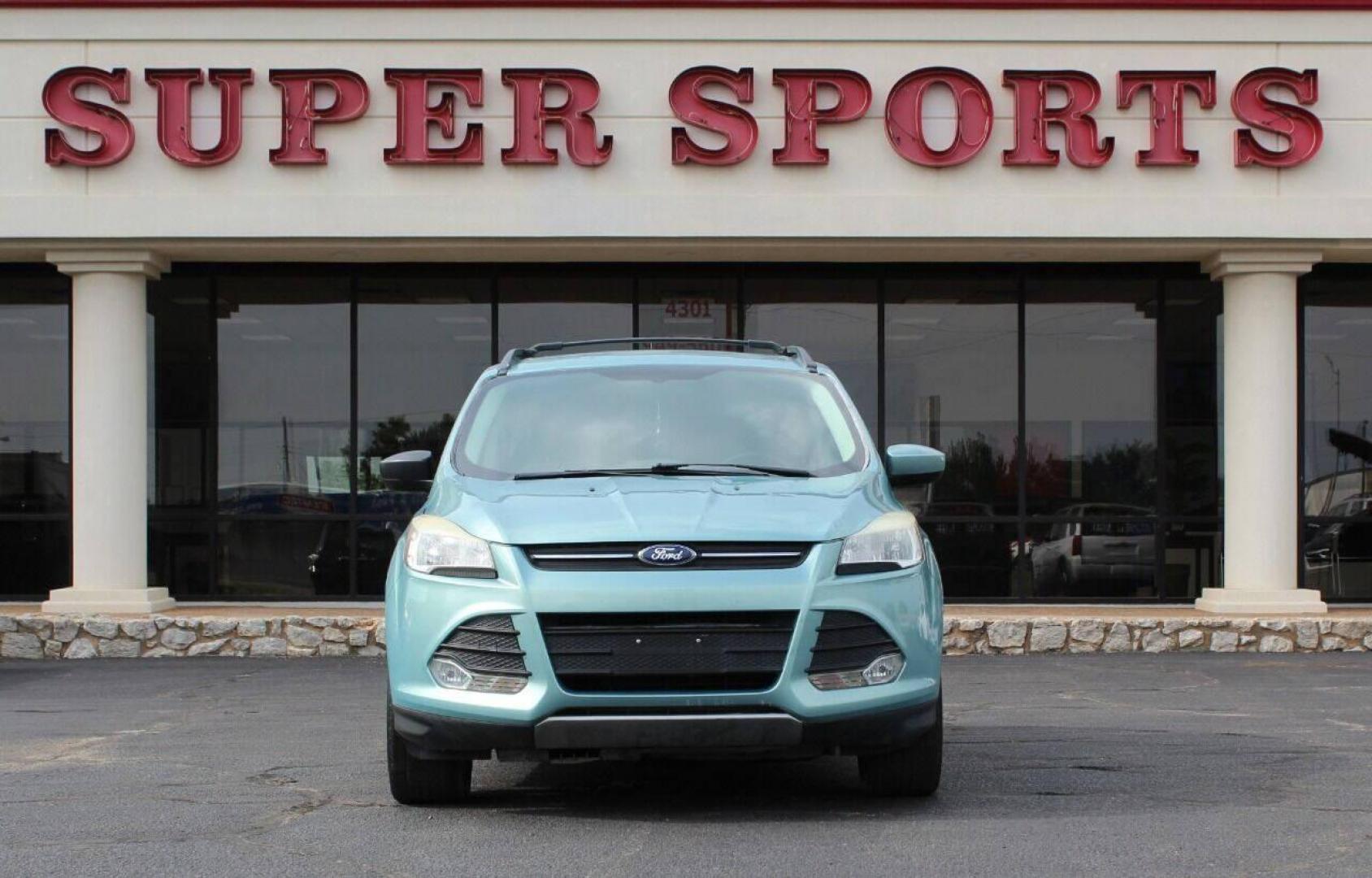 2013 Teal Ford Escape (1FMCU0GX7DU) with an 1.6L I4 Turbocharger 1.6L I4 engine, Automatic 6-Speed transmission, located at 4301 NW 39th , Oklahoma City, OK, 73112, (405) 949-5600, 35.512135, -97.598671 - NO DRIVERS LICENCE NO-FULL COVERAGE INSURANCE-NO CREDIT CHECK. COME ON OVER TO SUPERSPORTS AND TAKE A LOOK AND TEST DRIVE PLEASE GIVE US A CALL AT (405) 949-5600. NO LICENSIA DE MANEJAR- NO SEGURO DE COBERTURA TOTAL- NO VERIFICACCION DE CREDITO. POR FAVOR VENGAN A SUPERSPORTS, ECHE UN VISTAZO Y - Photo#0