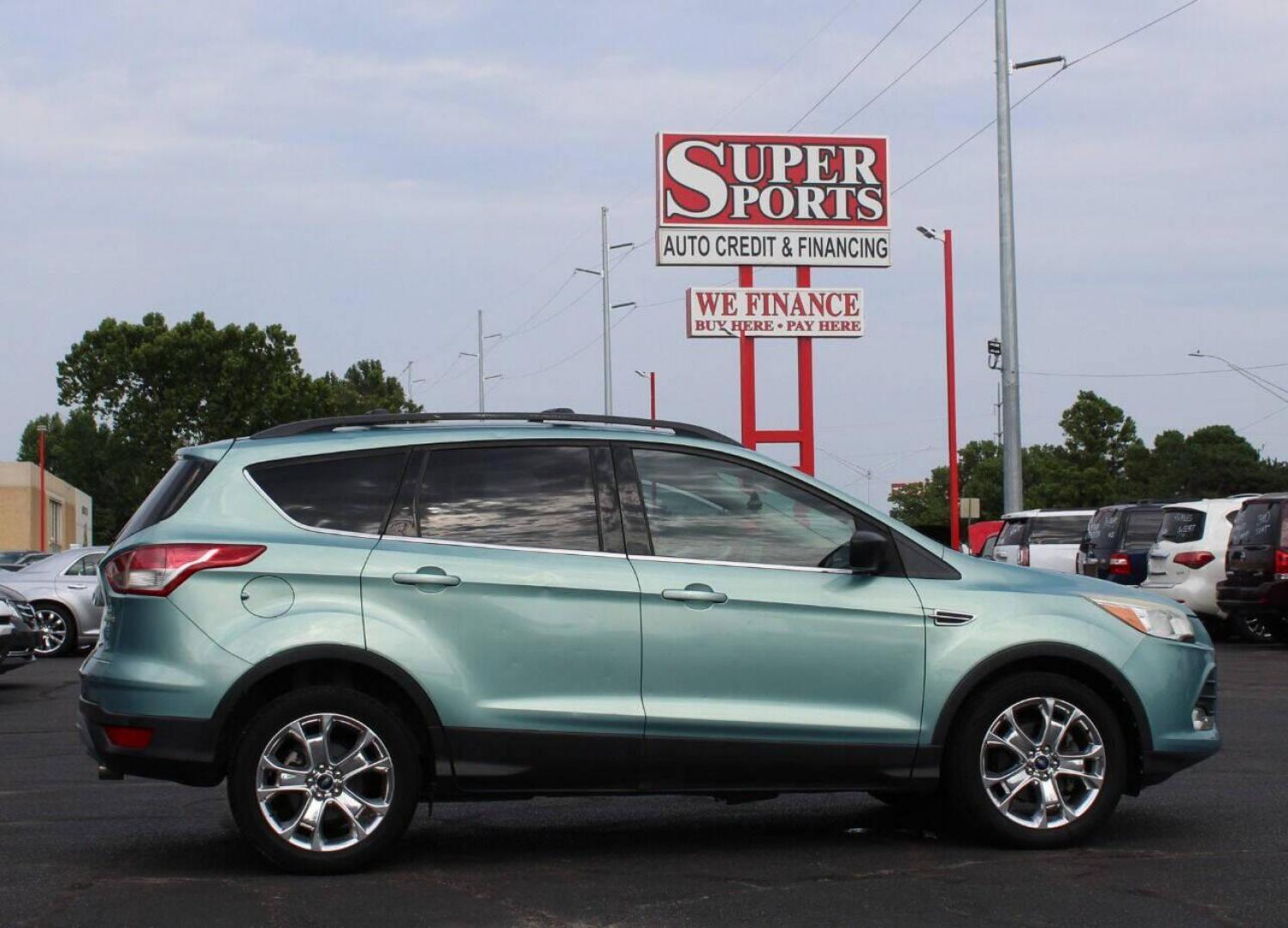 2013 Teal Ford Escape (1FMCU0GX7DU) with an 1.6L I4 Turbocharger 1.6L I4 engine, Automatic 6-Speed transmission, located at 4301 NW 39th , Oklahoma City, OK, 73112, (405) 949-5600, 35.512135, -97.598671 - NO DRIVERS LICENCE NO-FULL COVERAGE INSURANCE-NO CREDIT CHECK. COME ON OVER TO SUPERSPORTS AND TAKE A LOOK AND TEST DRIVE PLEASE GIVE US A CALL AT (405) 949-5600. NO LICENSIA DE MANEJAR- NO SEGURO DE COBERTURA TOTAL- NO VERIFICACCION DE CREDITO. POR FAVOR VENGAN A SUPERSPORTS, ECHE UN VISTAZO Y - Photo#3