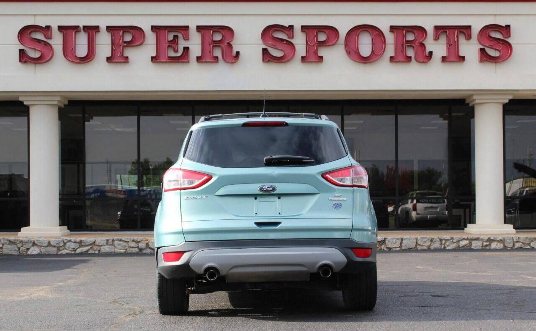 2013 Teal Ford Escape (1FMCU0GX7DU) with an 1.6L I4 Turbocharger 1.6L I4 engine, Automatic 6-Speed transmission, located at 4301 NW 39th , Oklahoma City, OK, 73112, (405) 949-5600, 35.512135, -97.598671 - NO DRIVERS LICENCE NO-FULL COVERAGE INSURANCE-NO CREDIT CHECK. COME ON OVER TO SUPERSPORTS AND TAKE A LOOK AND TEST DRIVE PLEASE GIVE US A CALL AT (405) 949-5600. NO LICENSIA DE MANEJAR- NO SEGURO DE COBERTURA TOTAL- NO VERIFICACCION DE CREDITO. POR FAVOR VENGAN A SUPERSPORTS, ECHE UN VISTAZO Y - Photo#4