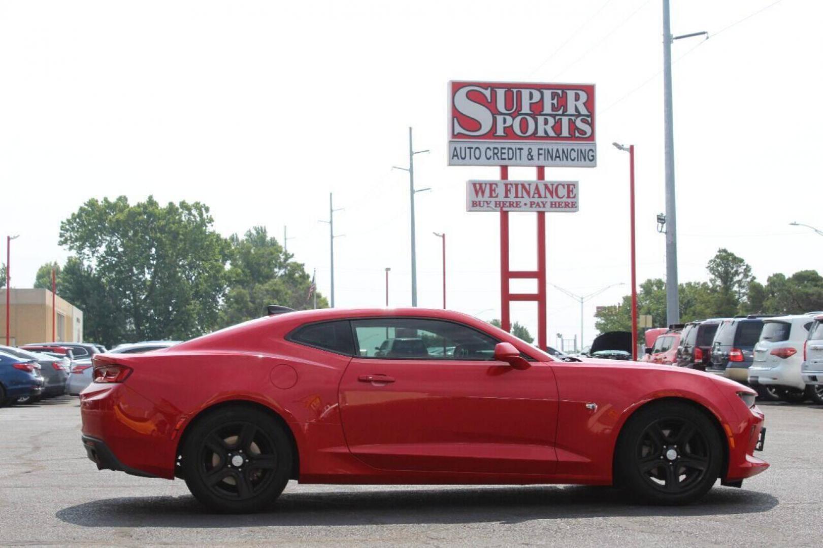 2016 Red Chevrolet Camaro 1LT Coupe (1G1FB1RS3G0) with an 3.6L V6 DOHC 24V engine, 6A transmission, located at 4301 NW 39th , Oklahoma City, OK, 73112, (405) 949-5600, 35.512135, -97.598671 - NO DRIVERS LICENSE - NO FULL COVERAGE INSURANCE - NO CREDIT CHECK. COME ON OVER TO SUPERSPORTS AND TAKE A LOOK AND TEST DRIVE PLEASE GIVE US A CALL AT (405) 949-5600. NO LICENCIA DE MANEJAR - NO SEGURO DE COBERTURA TOTAL - NO VERIFICACION DE CREDITO. POR FAVOR VENGAN A SUPERSPORTS, EC - Photo#3