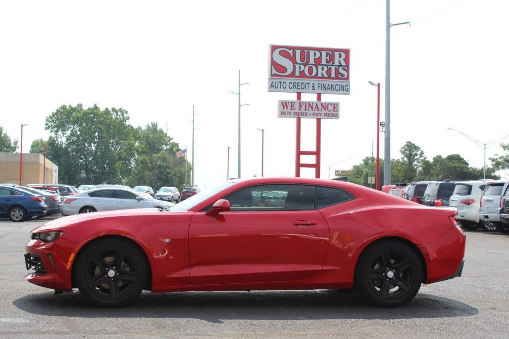 2016 Red Chevrolet Camaro 1LT Coupe (1G1FB1RS3G0) with an 3.6L V6 DOHC 24V engine, 6A transmission, located at 4301 NW 39th , Oklahoma City, OK, 73112, (405) 949-5600, 35.512135, -97.598671 - NO DRIVERS LICENSE - NO FULL COVERAGE INSURANCE - NO CREDIT CHECK. COME ON OVER TO SUPERSPORTS AND TAKE A LOOK AND TEST DRIVE PLEASE GIVE US A CALL AT (405) 949-5600. NO LICENCIA DE MANEJAR - NO SEGURO DE COBERTURA TOTAL - NO VERIFICACION DE CREDITO. POR FAVOR VENGAN A SUPERSPORTS, EC - Photo#6