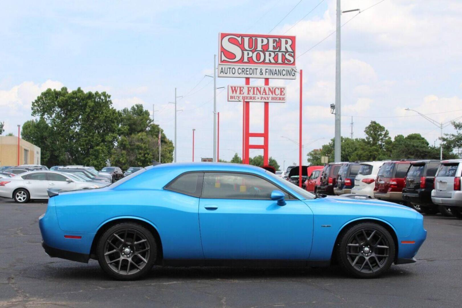 2016 Blue Dodge Challenger R/T Plus (2C3CDZBT4GH) with an 5.7L V8 OHV 16V engine, Manual 6-Speed transmission, located at 4301 NW 39th , Oklahoma City, OK, 73112, (405) 949-5600, 35.512135, -97.598671 - NO DRIVERS LICENSE - NO FULL COVERAGE INSURANCE - NO CREDIT CHECK. COME ON OVER TO SUPERSPORTS AND TAKE A LOOK AND TEST DRIVE PLEASE GIVE US A CALL AT (405) 949-5600. NO LICENCIA DE MANEJAR - NO SEGURO DE COBERTURA TOTAL - NO VERIFICACION DE CREDITO. POR FAVOR VENGAN A SUPERSPORTS, ECH - Photo#3