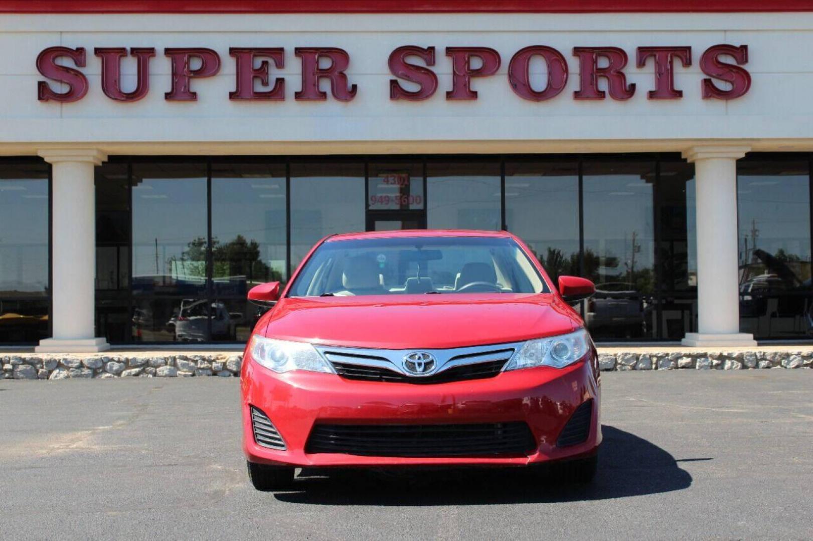 2014 Red Toyota Camry L (4T4BF1FK3ER) with an 2.5L L4 DOHC 16V engine, 6-Speed Automatic transmission, located at 4301 NW 39th , Oklahoma City, OK, 73112, (405) 949-5600, 35.512135, -97.598671 - Photo#0