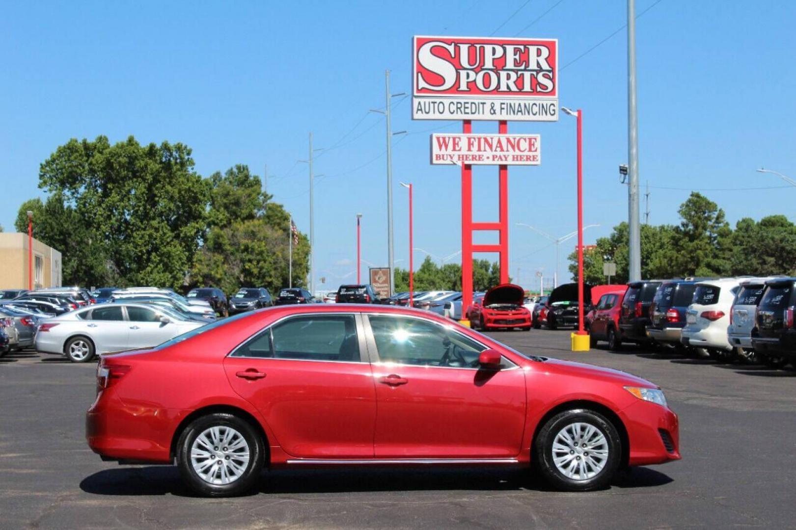 2014 Red Toyota Camry L (4T4BF1FK3ER) with an 2.5L L4 DOHC 16V engine, 6-Speed Automatic transmission, located at 4301 NW 39th , Oklahoma City, OK, 73112, (405) 949-5600, 35.512135, -97.598671 - Photo#3