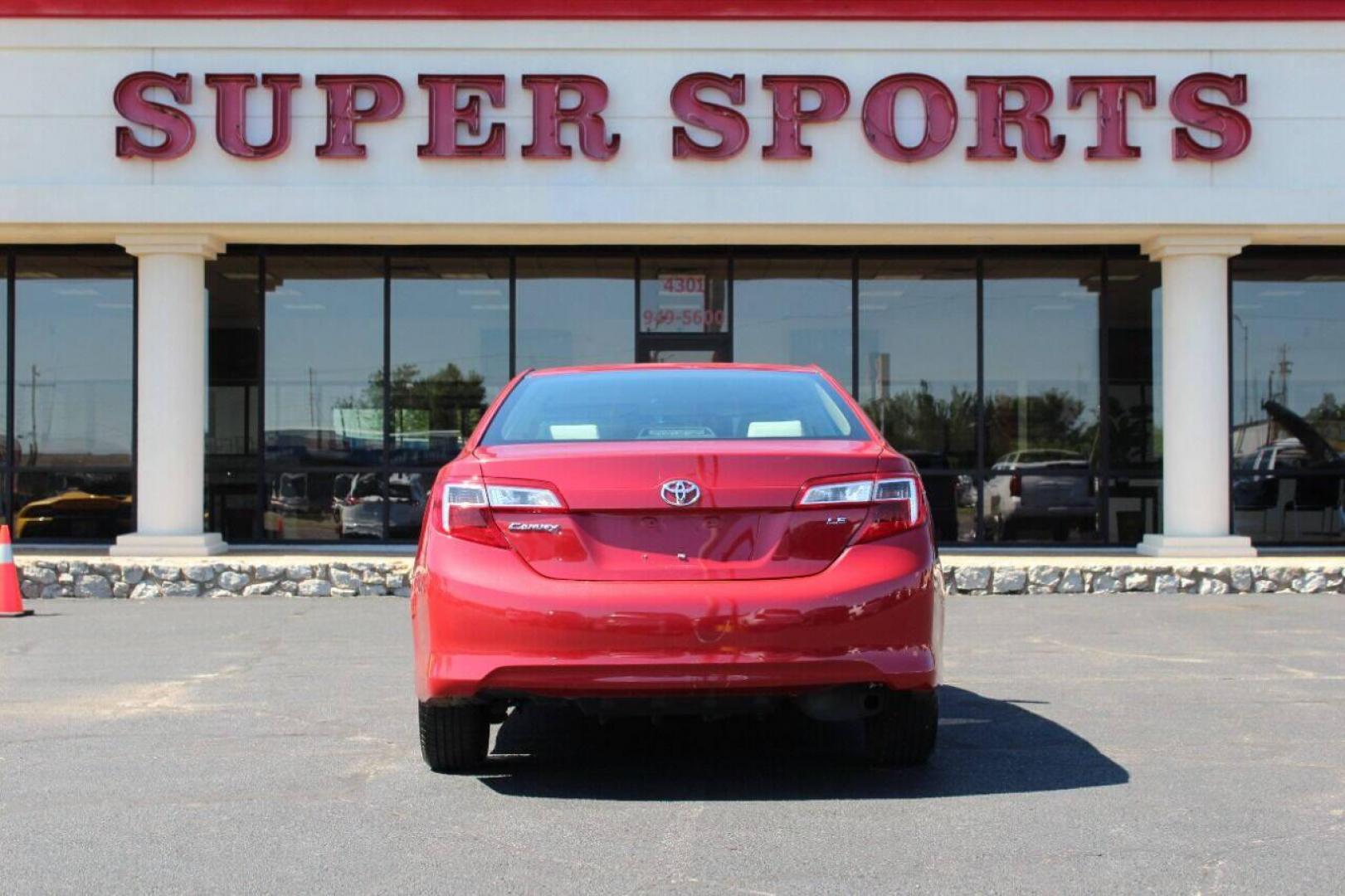 2014 Red Toyota Camry L (4T4BF1FK3ER) with an 2.5L L4 DOHC 16V engine, 6-Speed Automatic transmission, located at 4301 NW 39th , Oklahoma City, OK, 73112, (405) 949-5600, 35.512135, -97.598671 - Photo#4